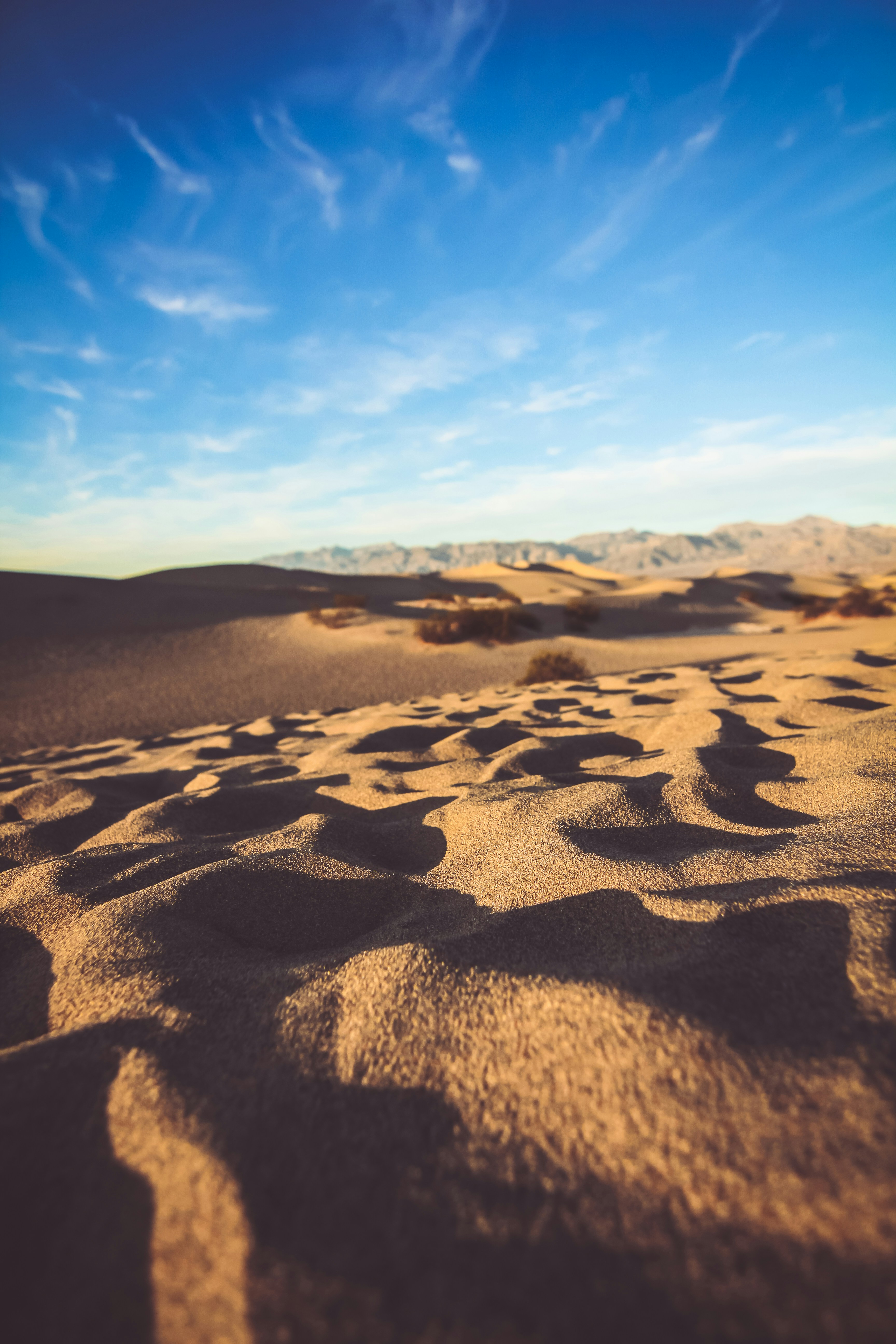 Desert Sand Dunes Under Blue Sky