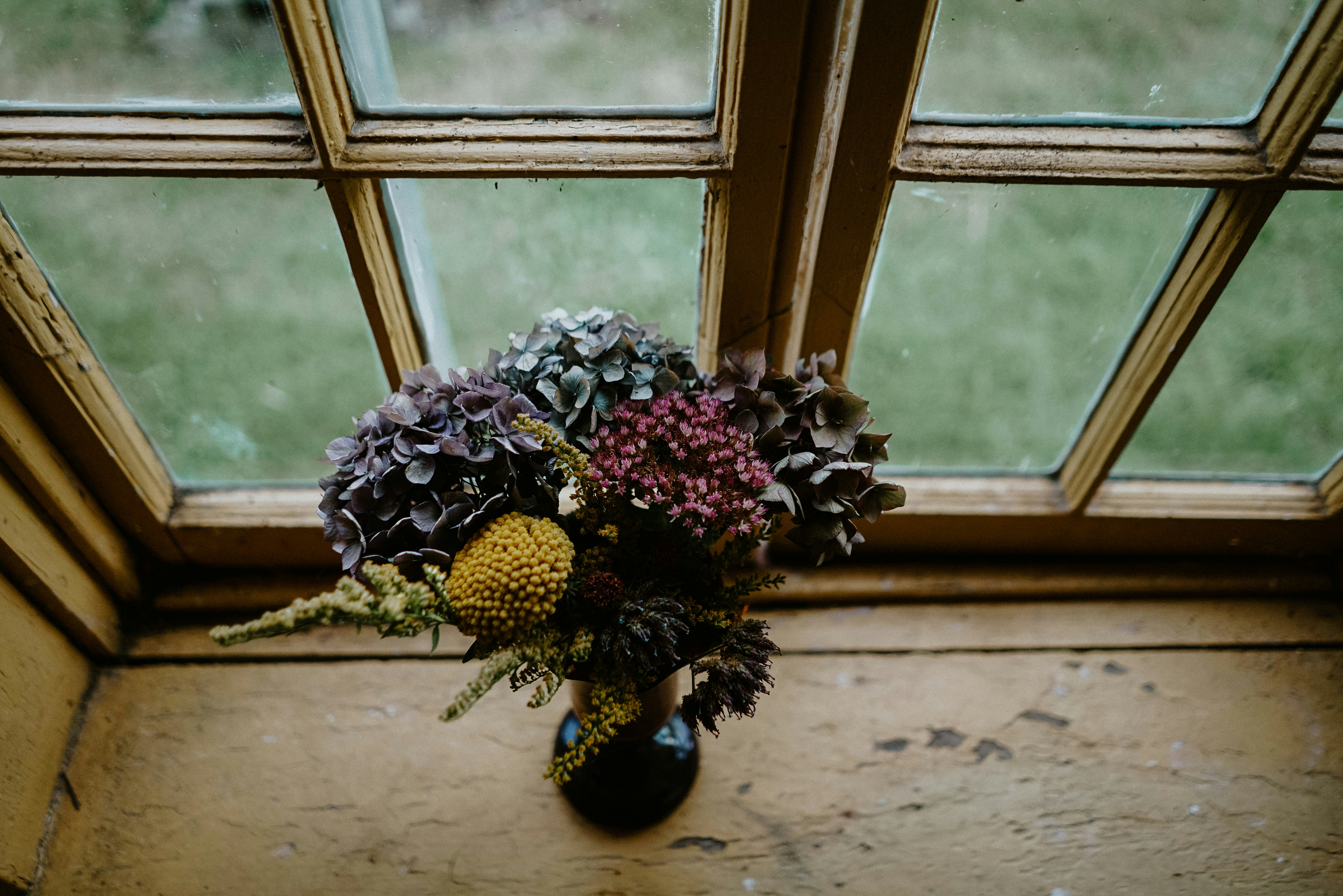 Dried Flower Bouquet by Old Window