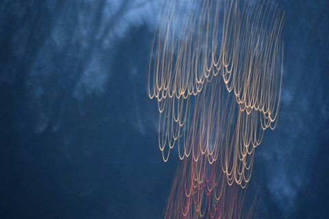 Curved Golden Light Trails