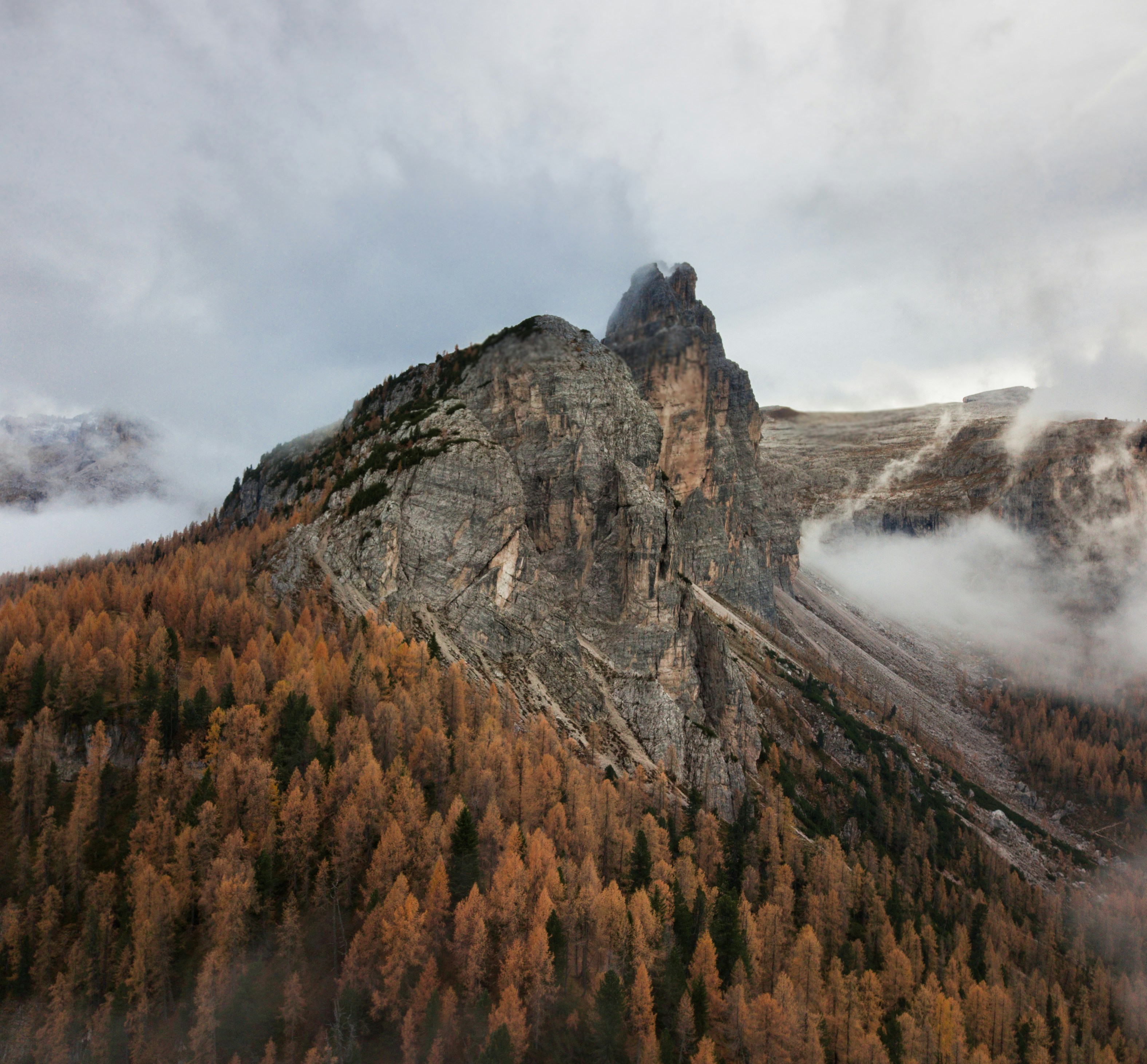 Autumn Rocky Mountain in Clouds
