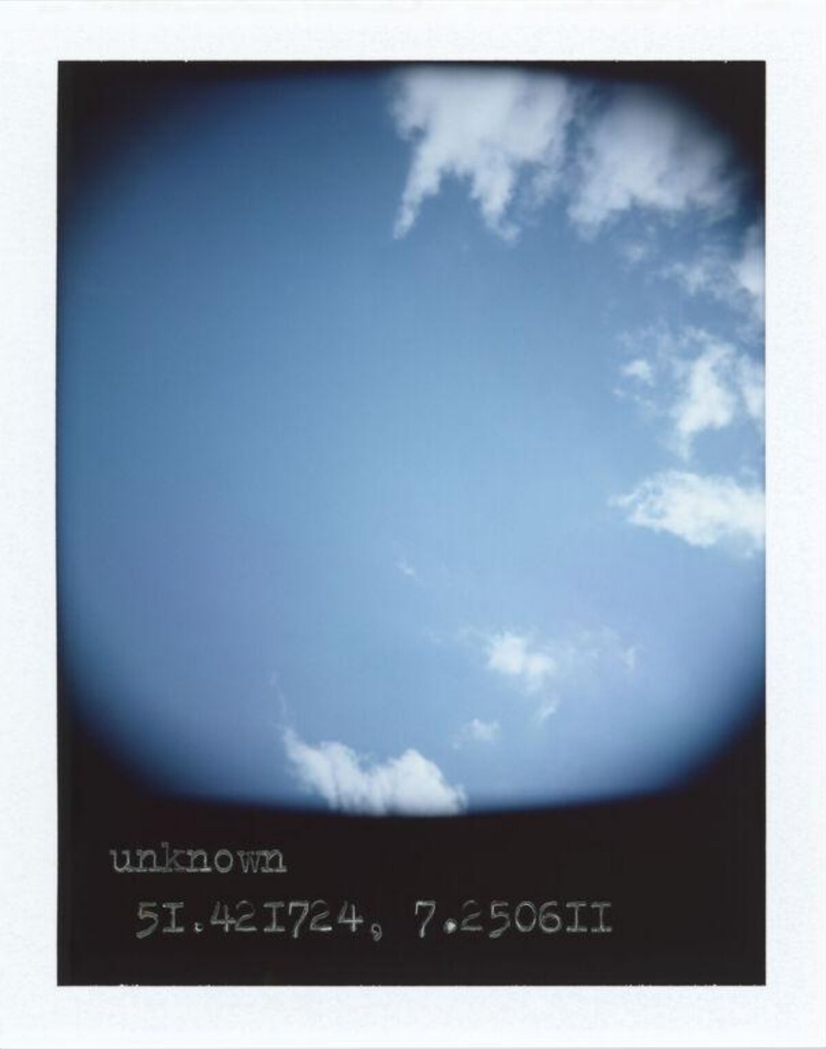 Polaroid of Blue Sky with Coordinates