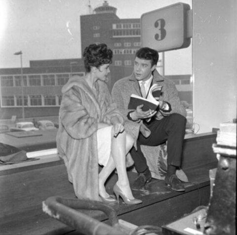 Man and Woman Chat at Airport Gate 3