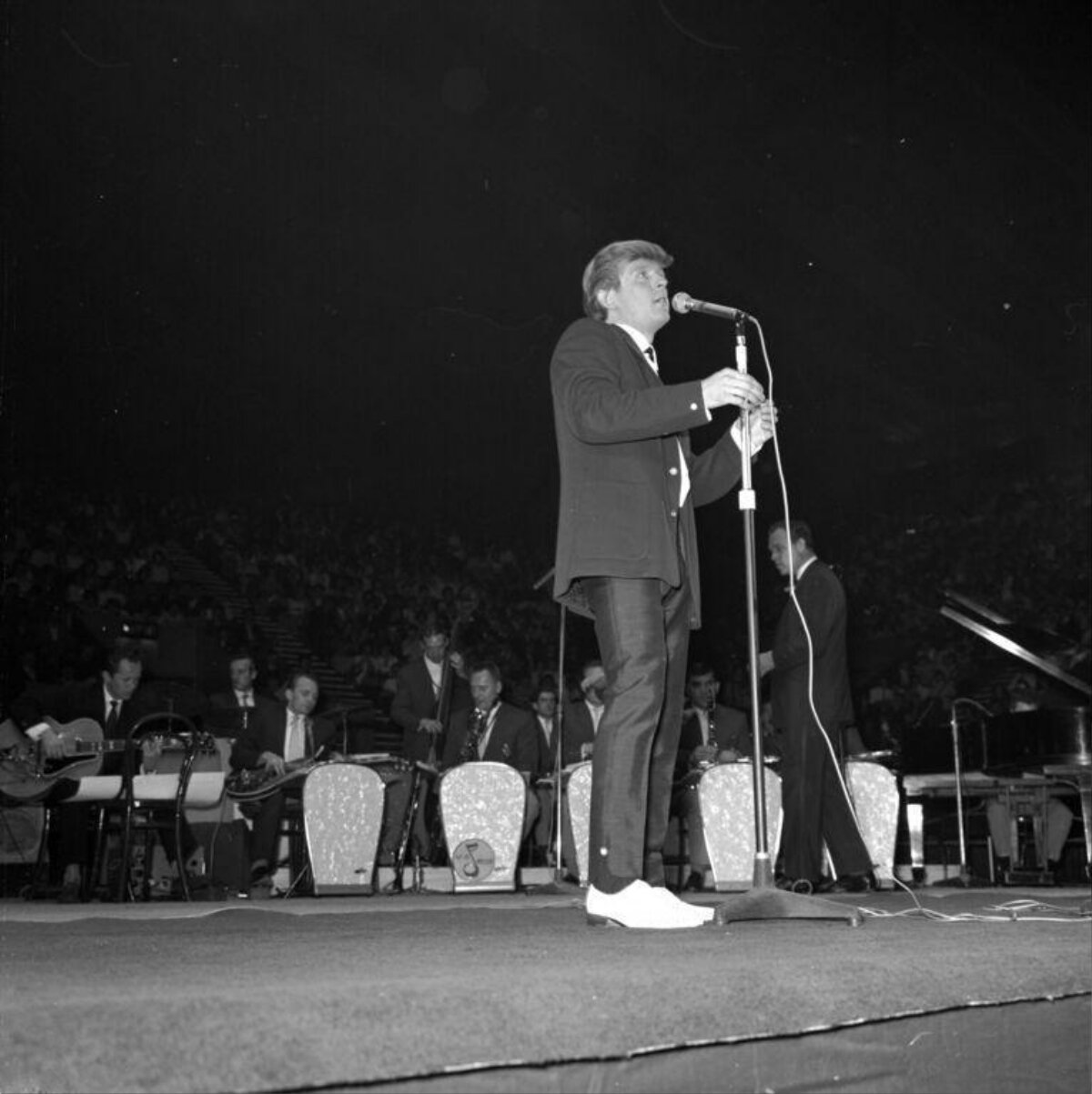 Young Donald Trump Performing on Stage