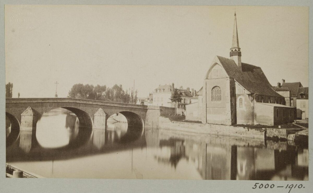 Vintage River Bridge and Church Scene