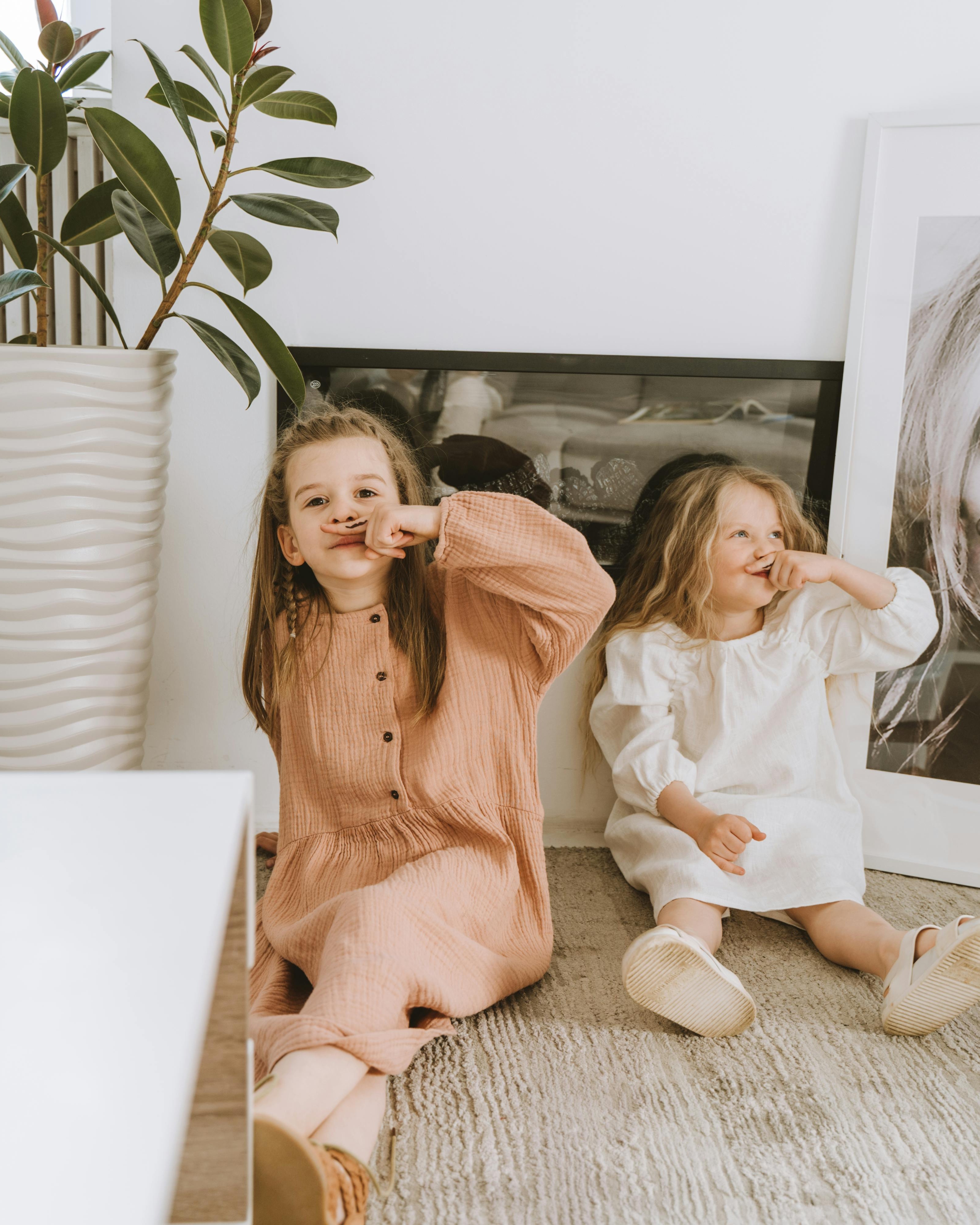 Two Little Girls Making Funny Faces