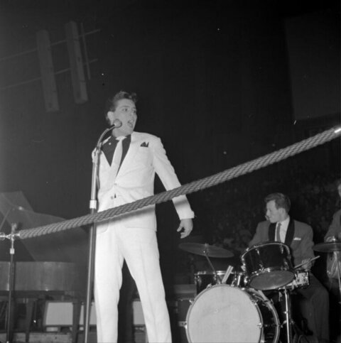 Vintage Singer Performing On Stage