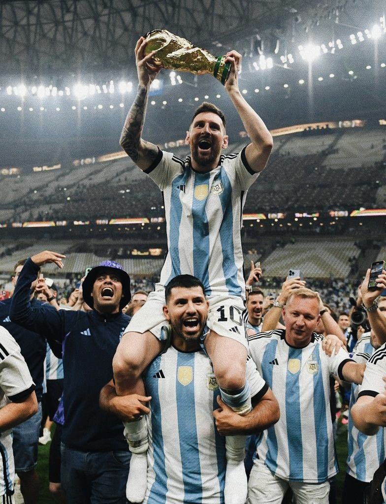 Messi Lifts World Cup Trophy