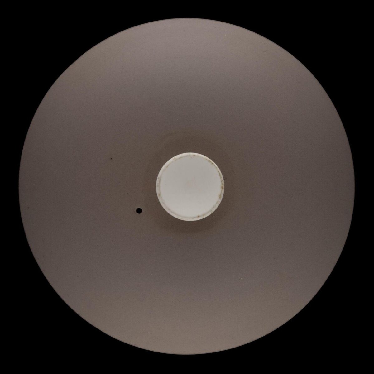 Circular Object on Black Background