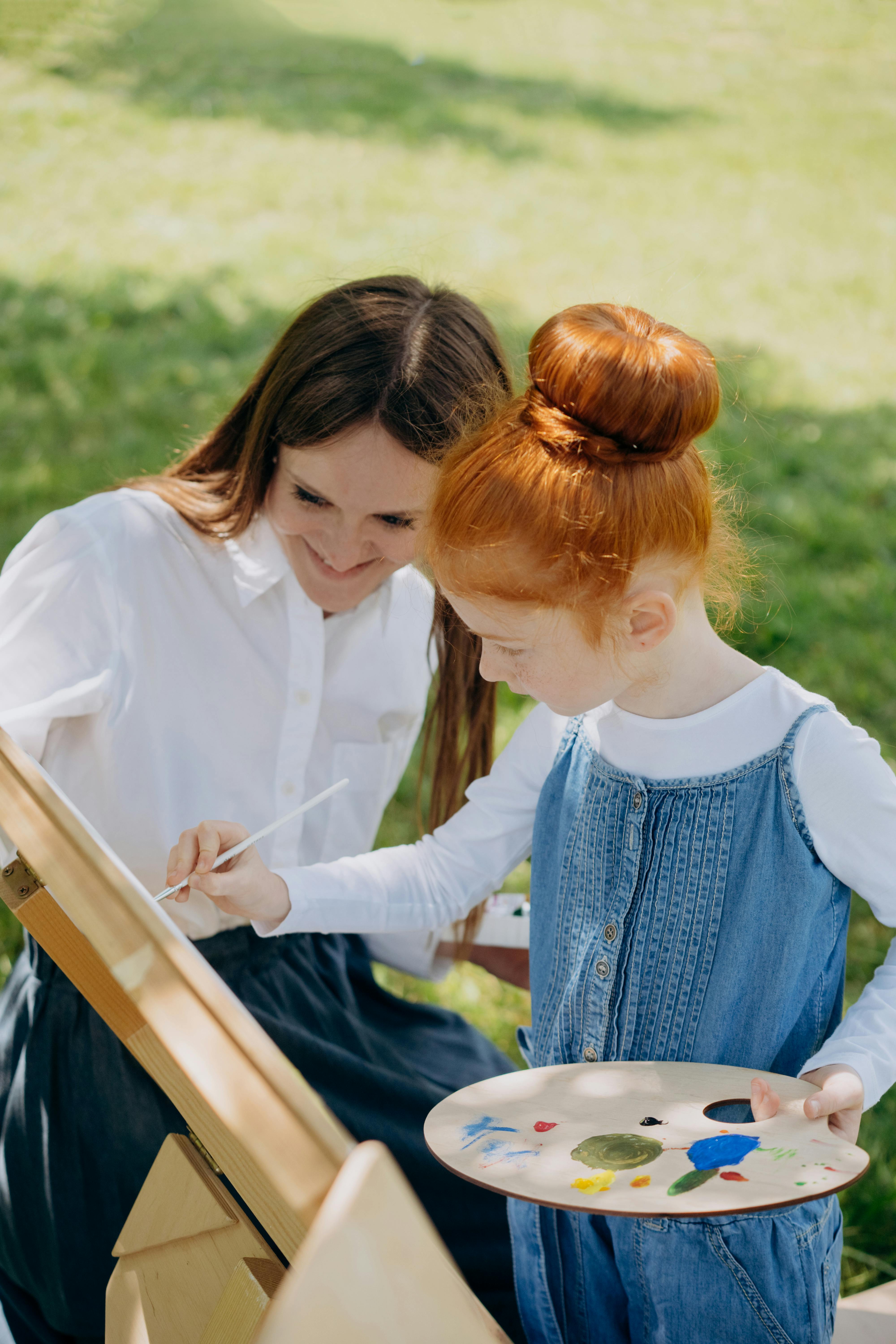 Woman and Girl Painting Outdoors