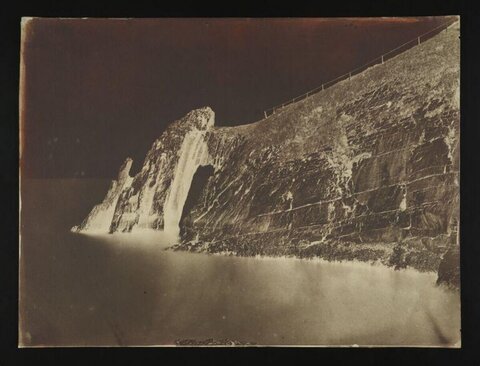 Vintage Coastal Cliff with Natural Arch