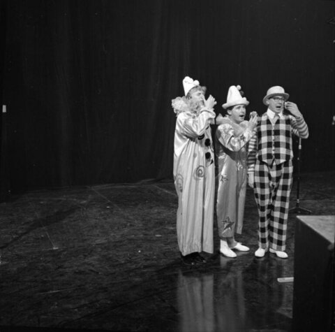 Three Clown Performers On Stage