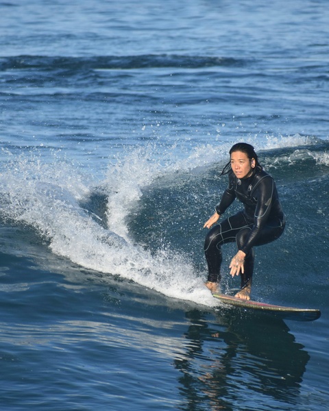Surfer Riding a Wave on the Ocean