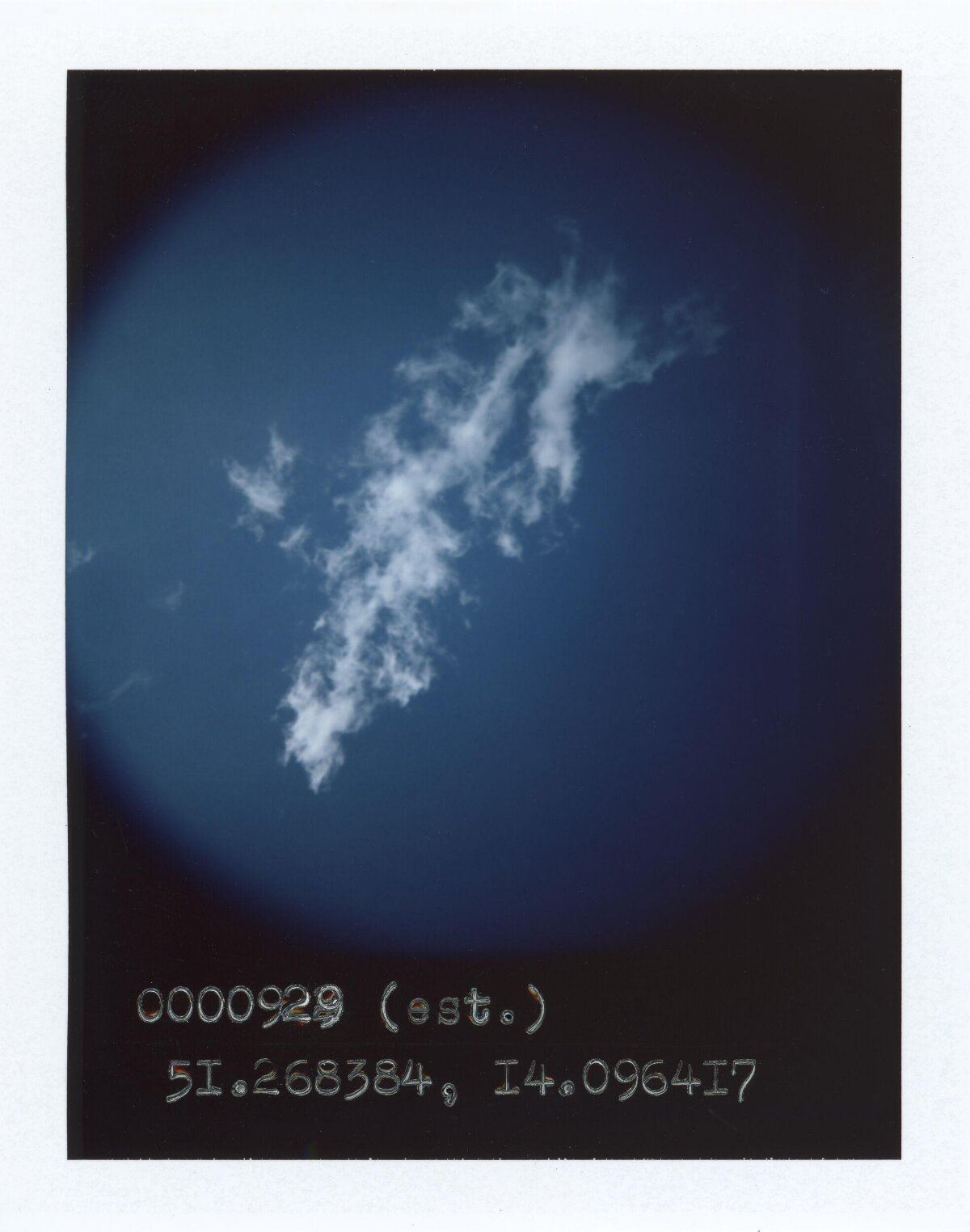 Wispy Cloud in Deep Blue Sky