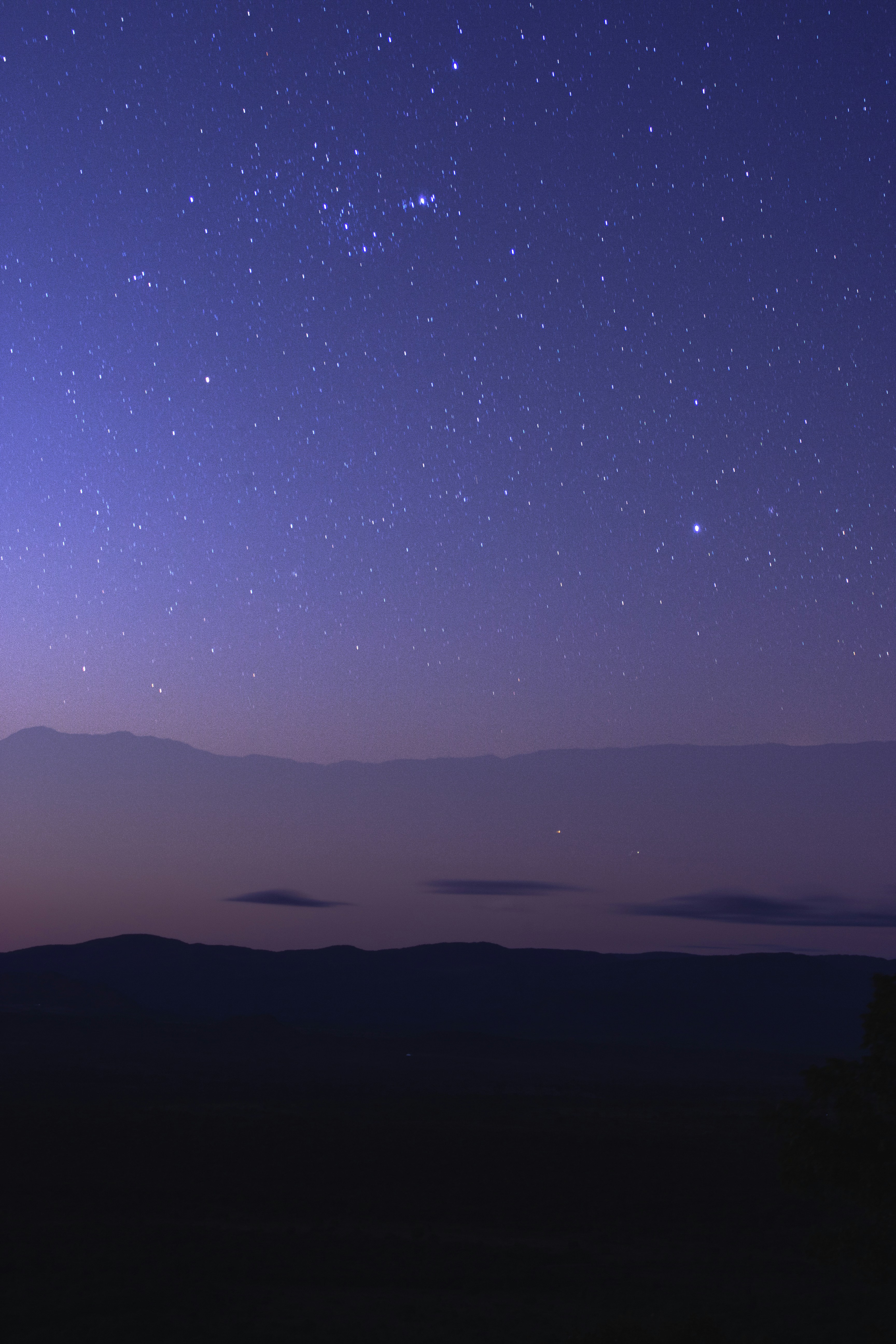 Starry Twilight Sky Over Mountains