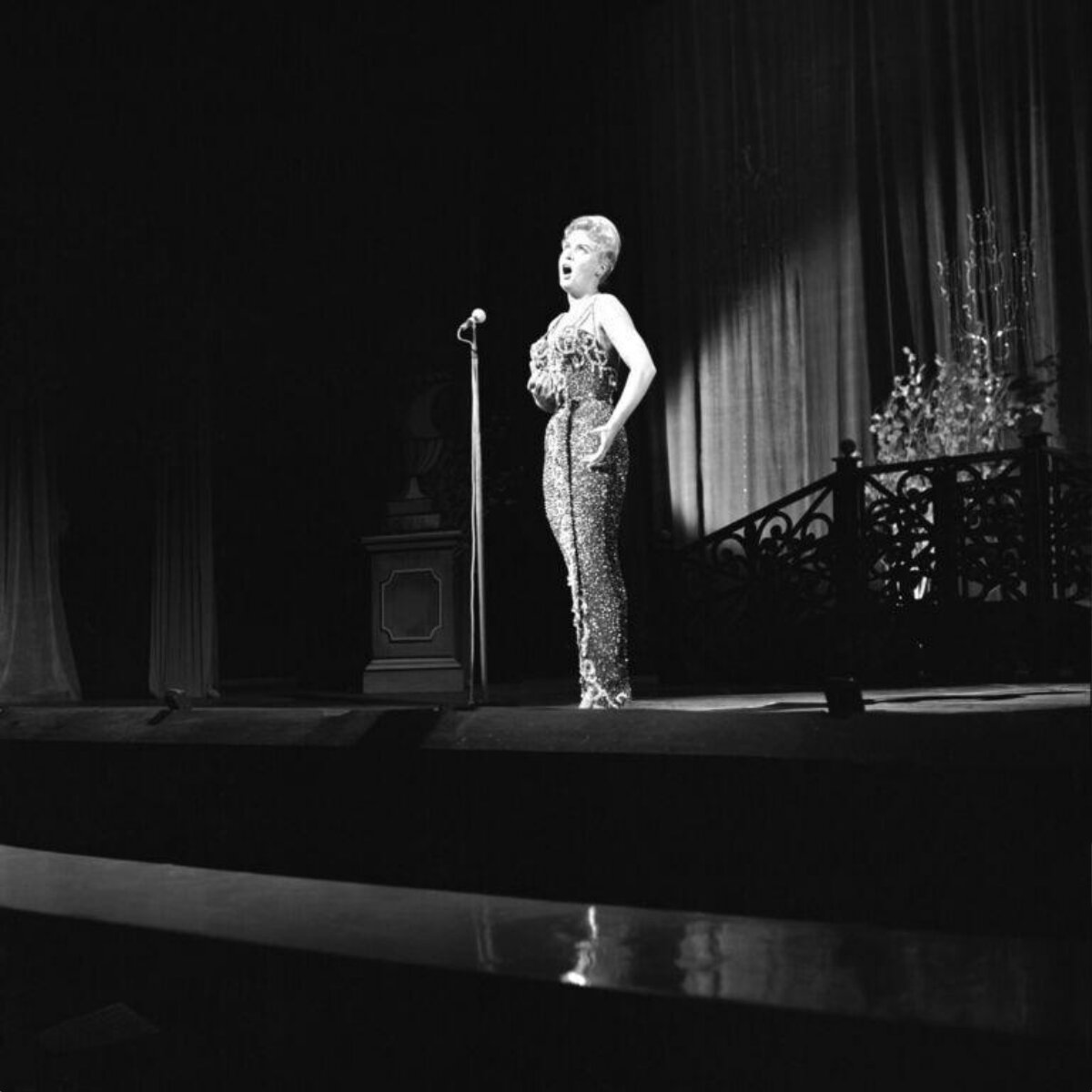 Female Singer Performing on Stage