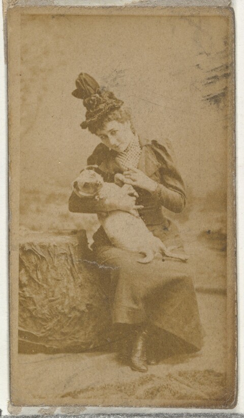 Vintage Portrait of Woman With Puppy