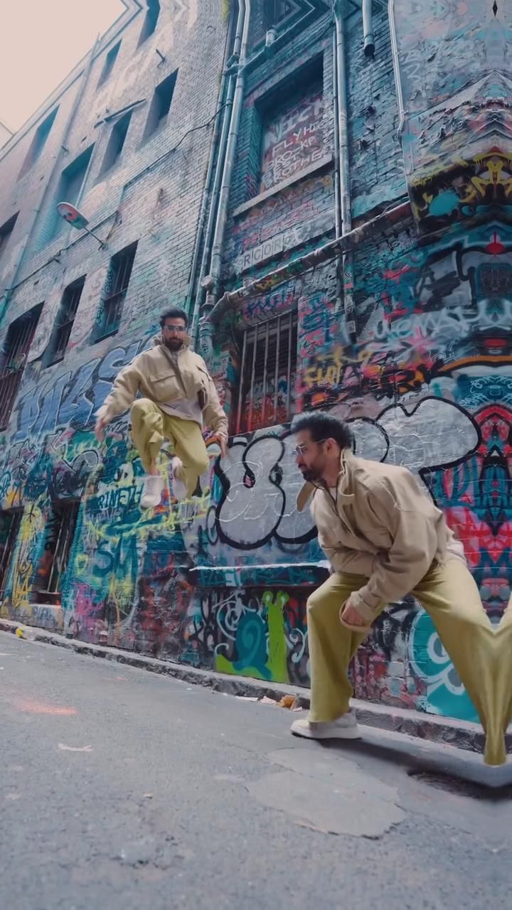 Creative Jump in Graffiti Alley