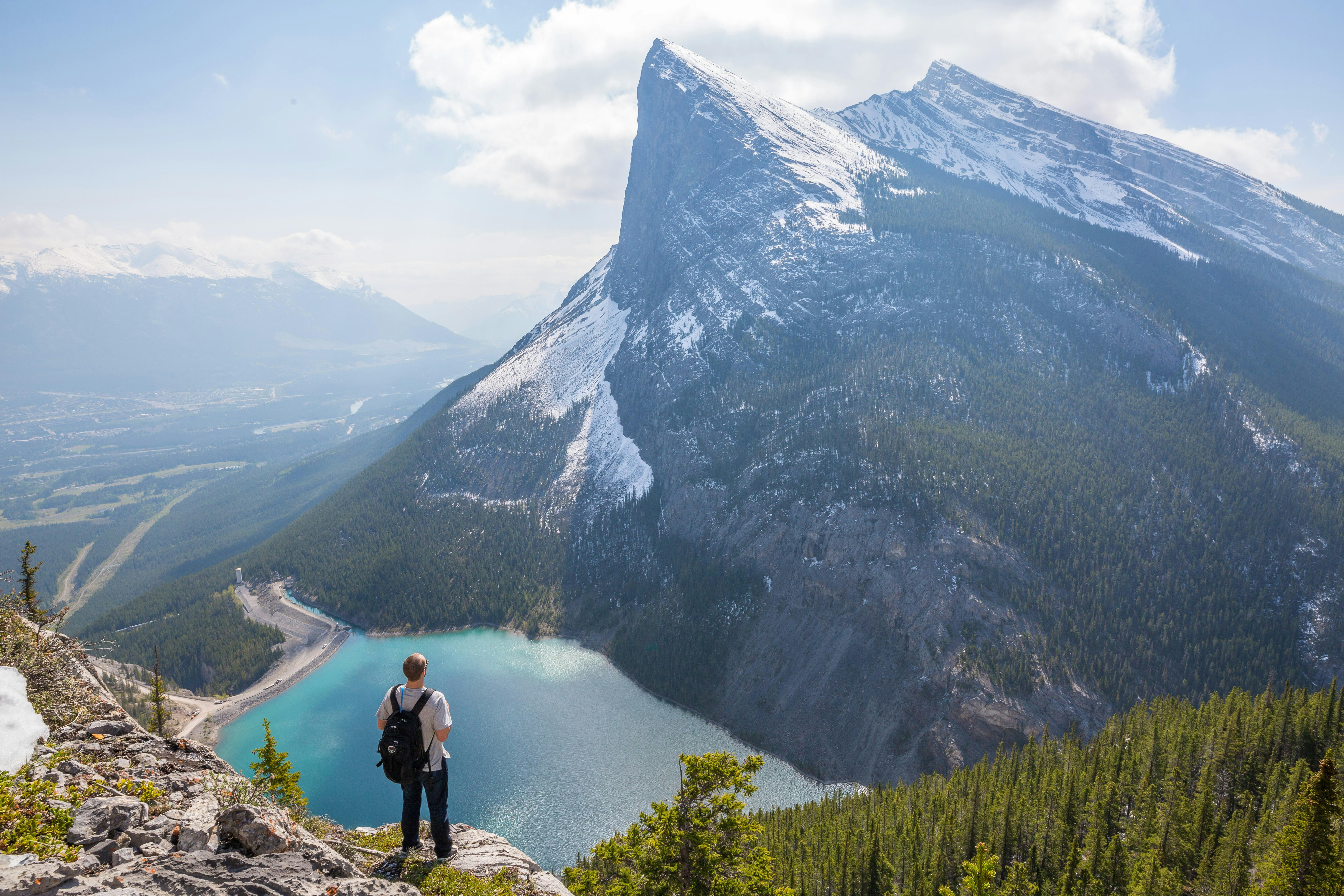 Hiker Overlooking Mountain Lake