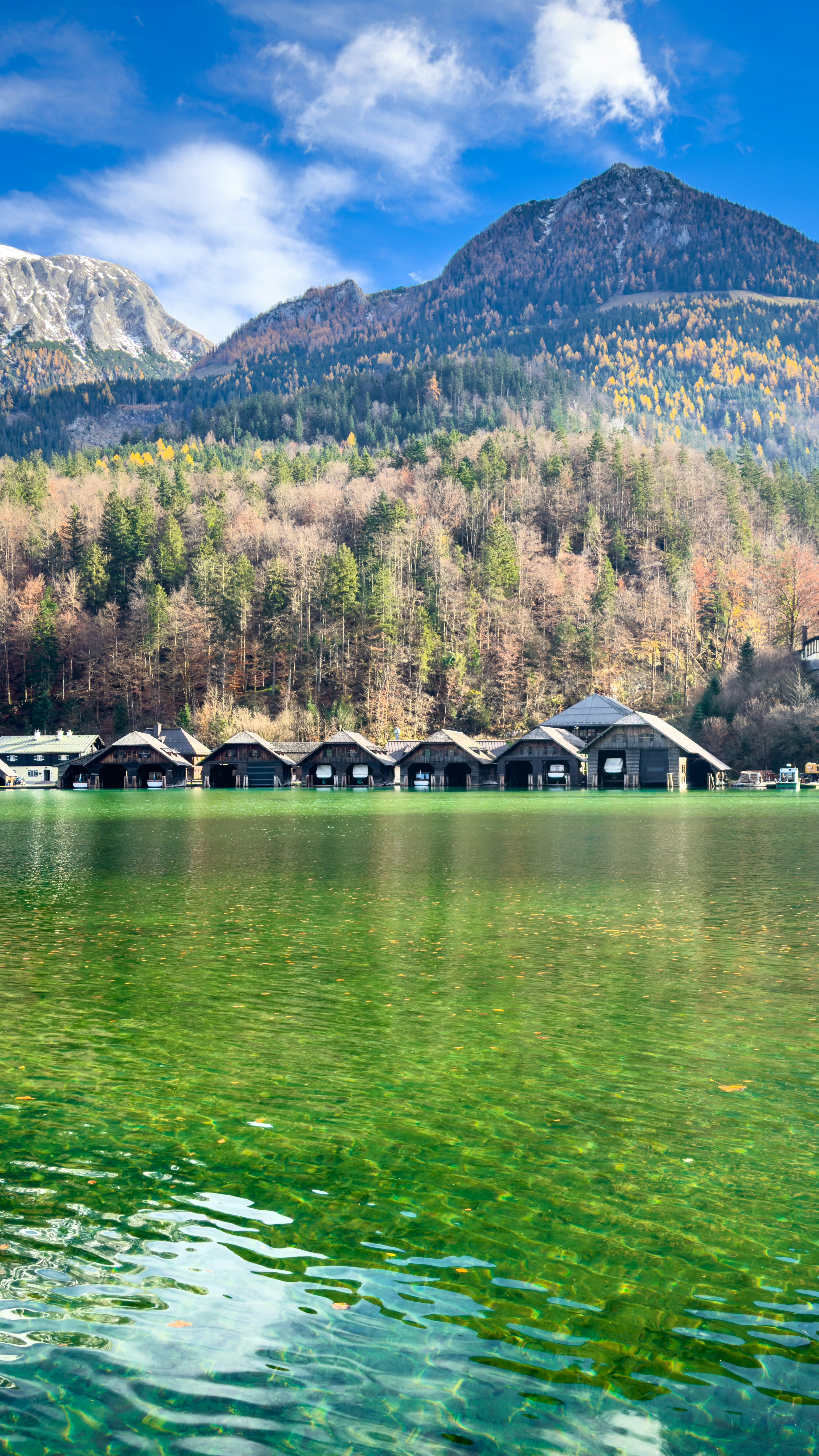 Autumn Mountain Lake with Boat Houses