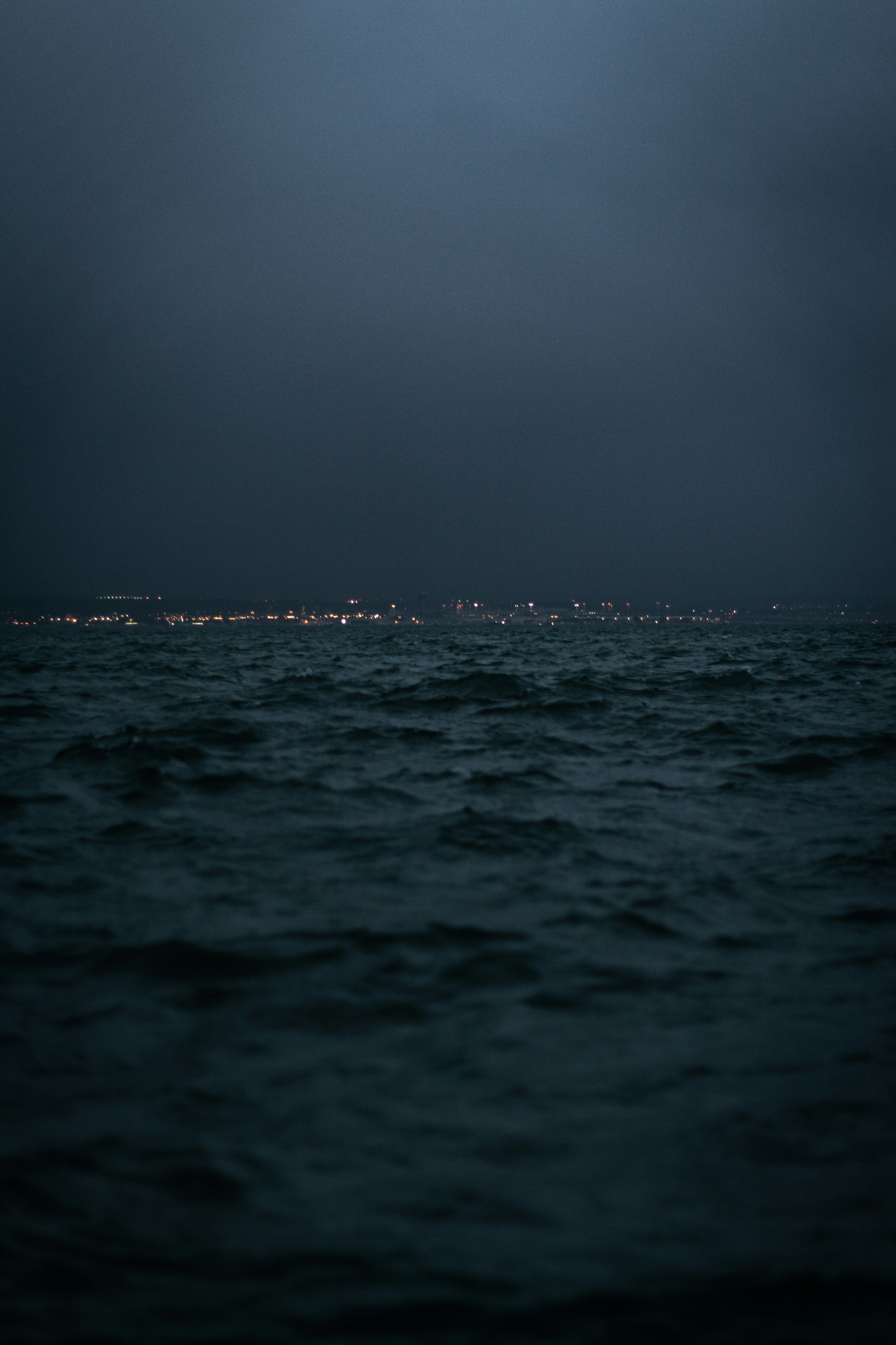 Night Sea and Distant City Lights