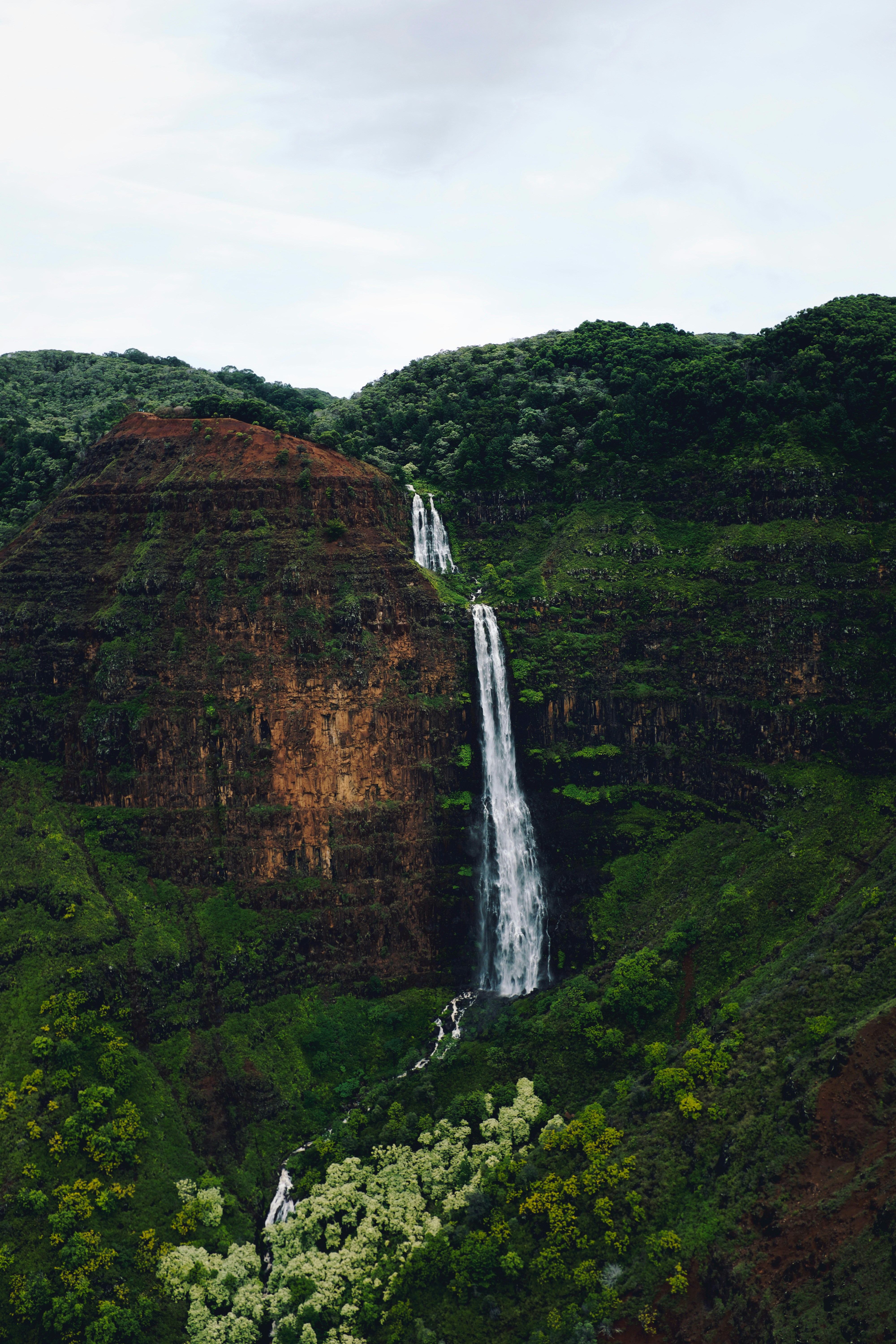 Two-tier Waterfall in Lush Canyon