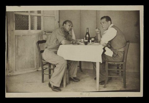 Two Men Dining at Table