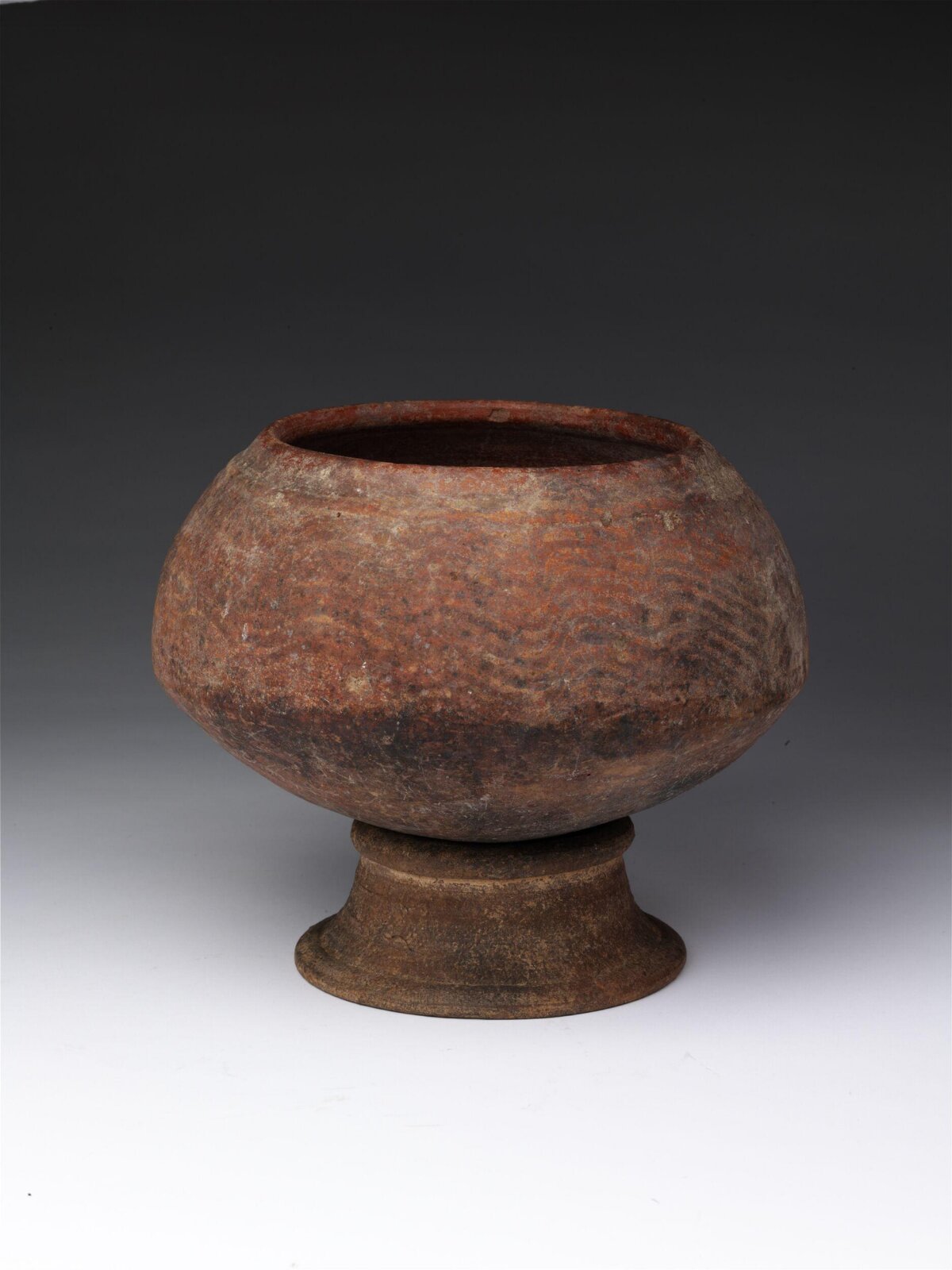 Ancient Patterned Pedestal Pottery