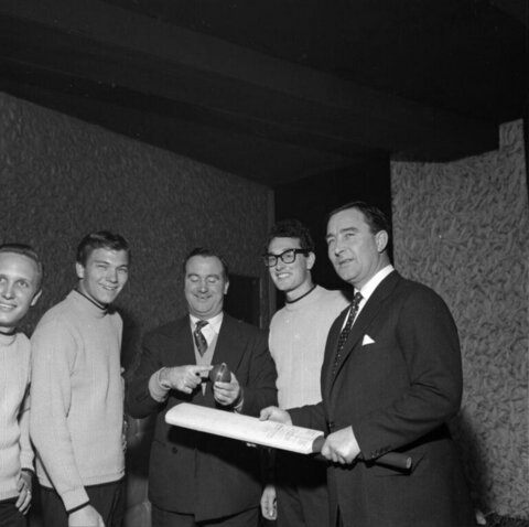 Five Men With Cricket Bat and Ball