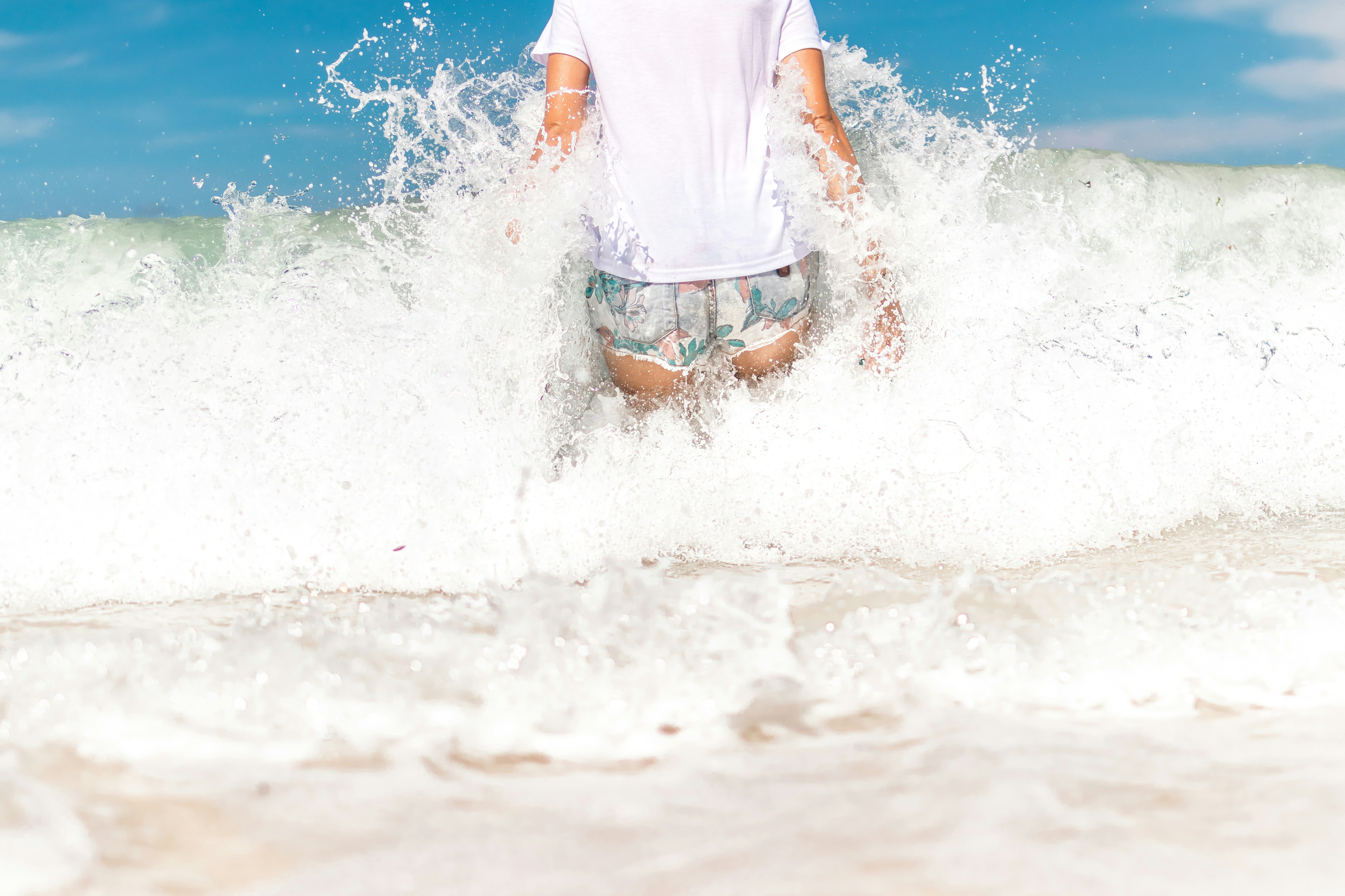 Back View Of Person In Sea Waves