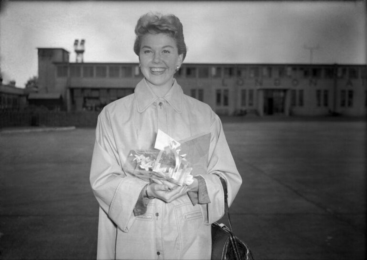 Smiling Woman at London Airport