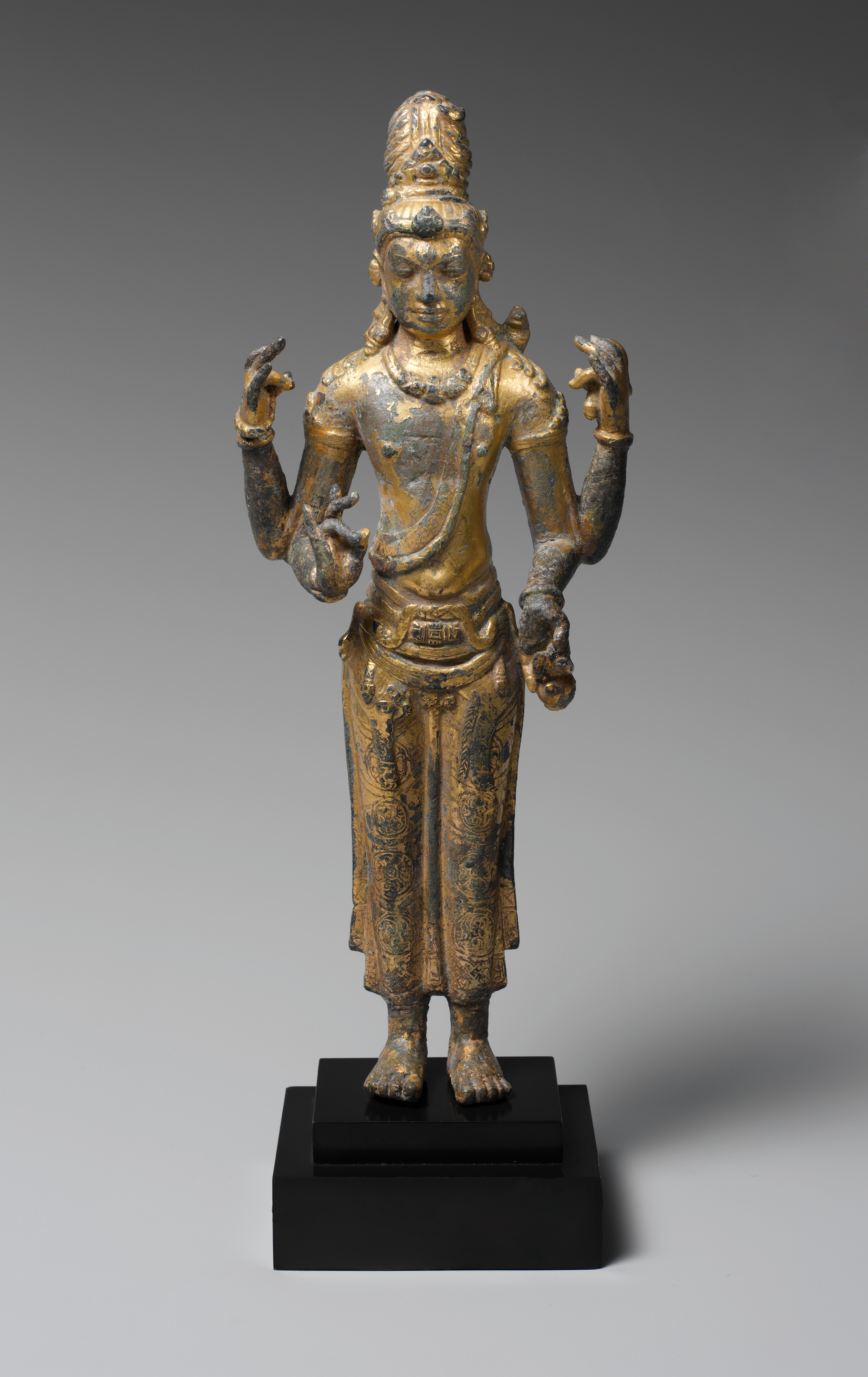 Gilt Bronze Four-Armed Bodhisattva Statue