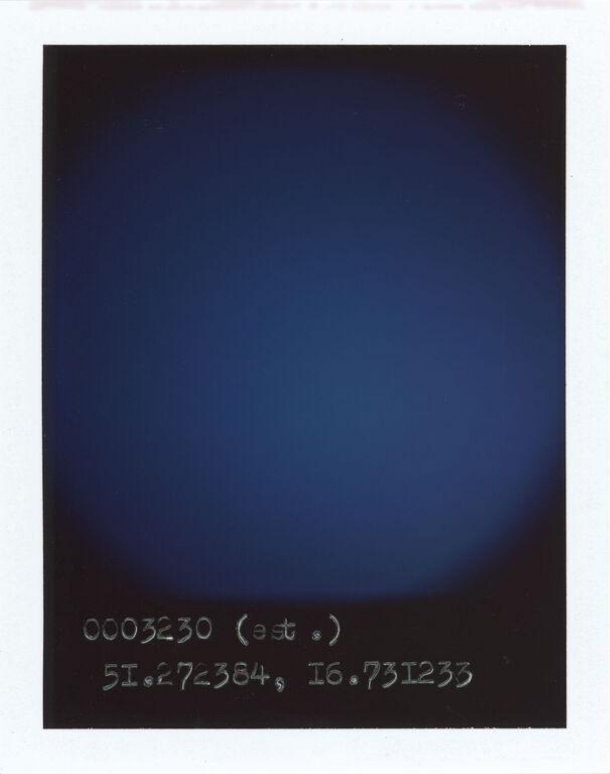 Polaroid With Handwritten Coordinates