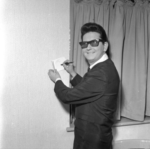 Roy Orbison Signing an Autograph