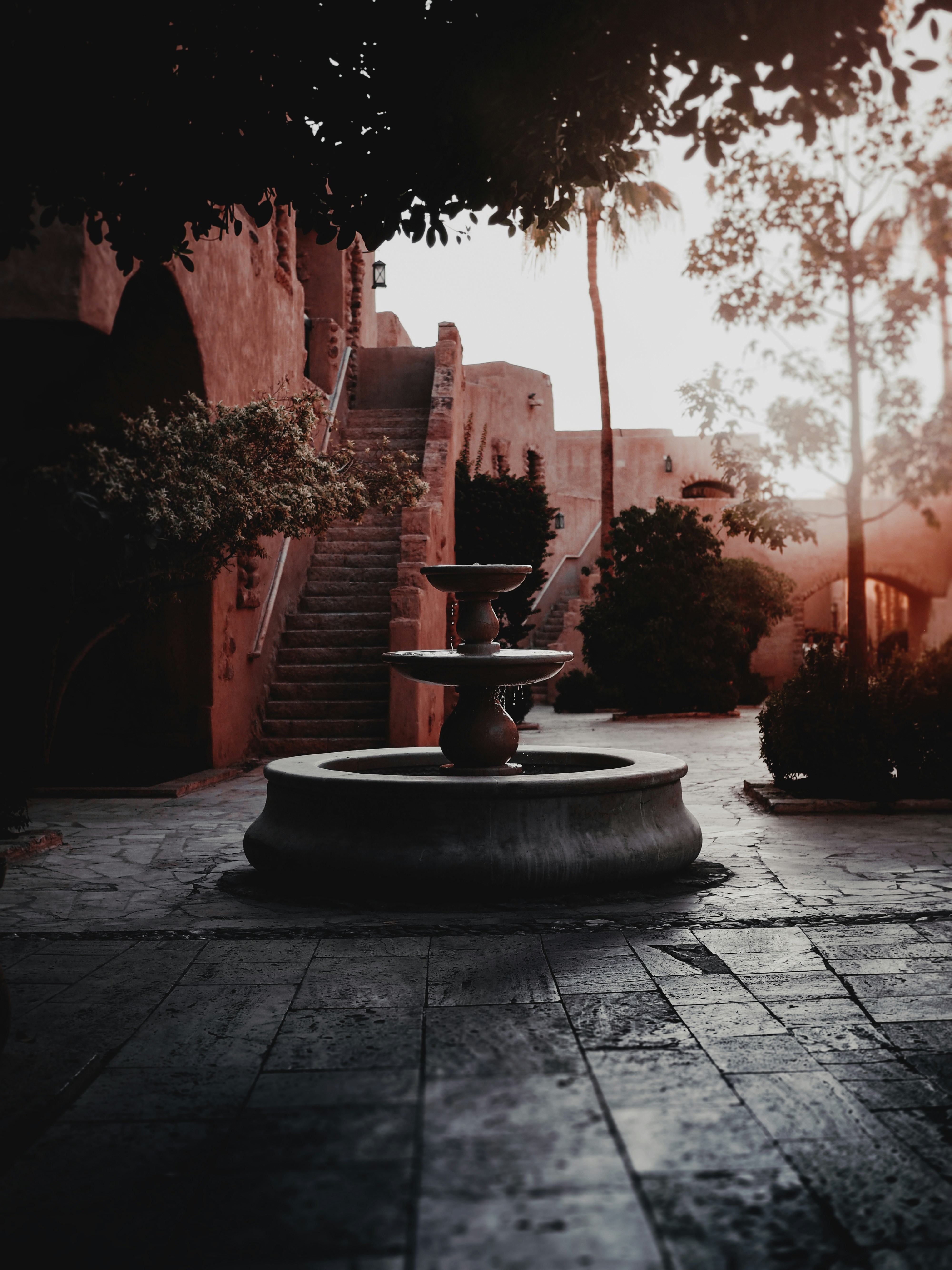 Sunlit Adobe Courtyard Fountain