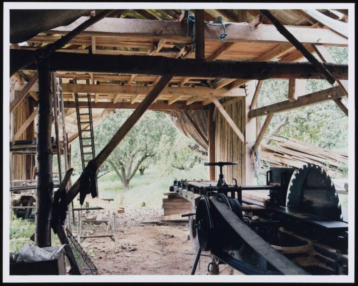 Vintage Sawmill in Open Wooden Workshop
