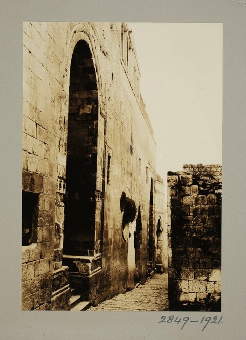 Old Stone Alley with Arched Buildings