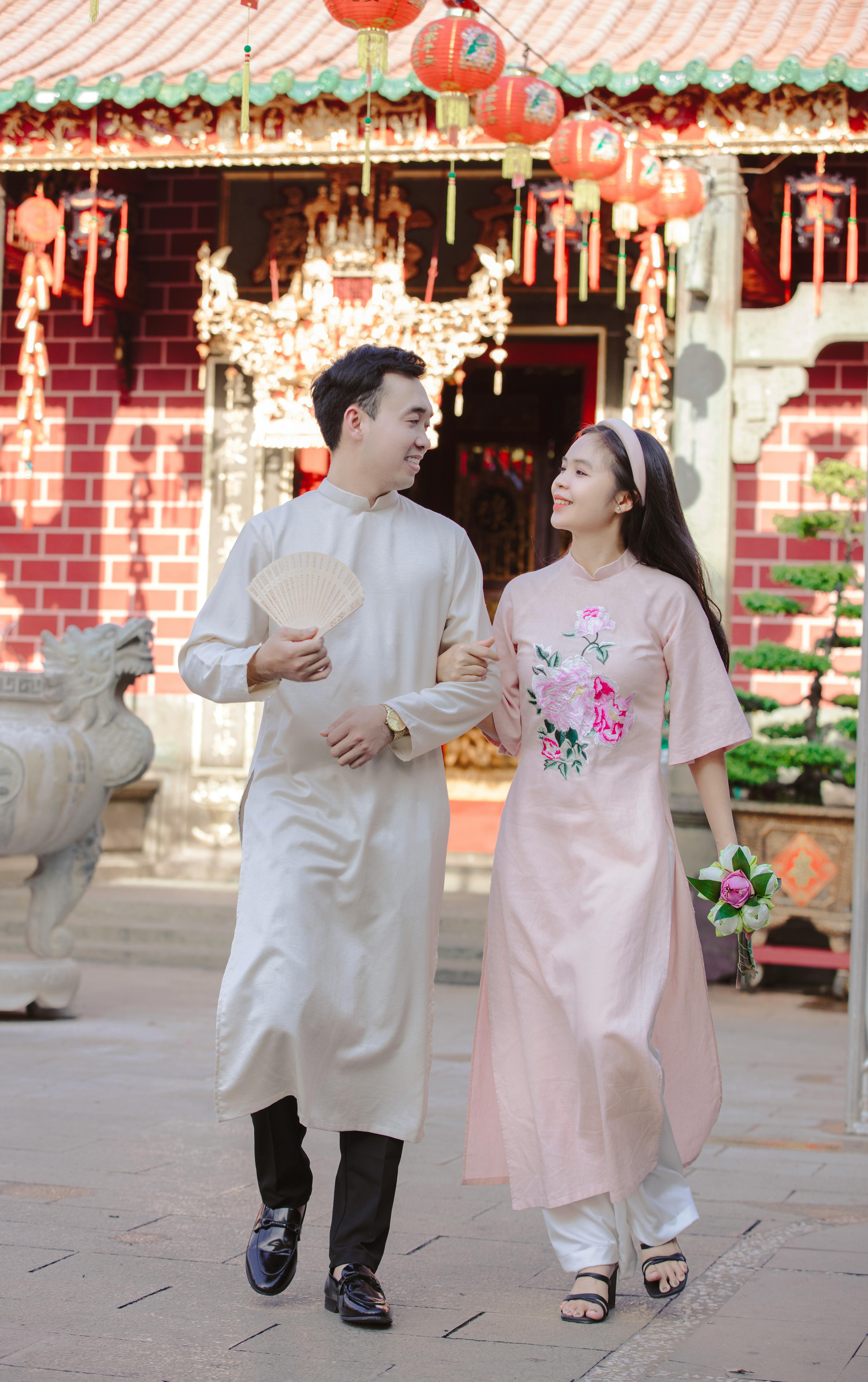 Couple in Ao Dai at Traditional Temple