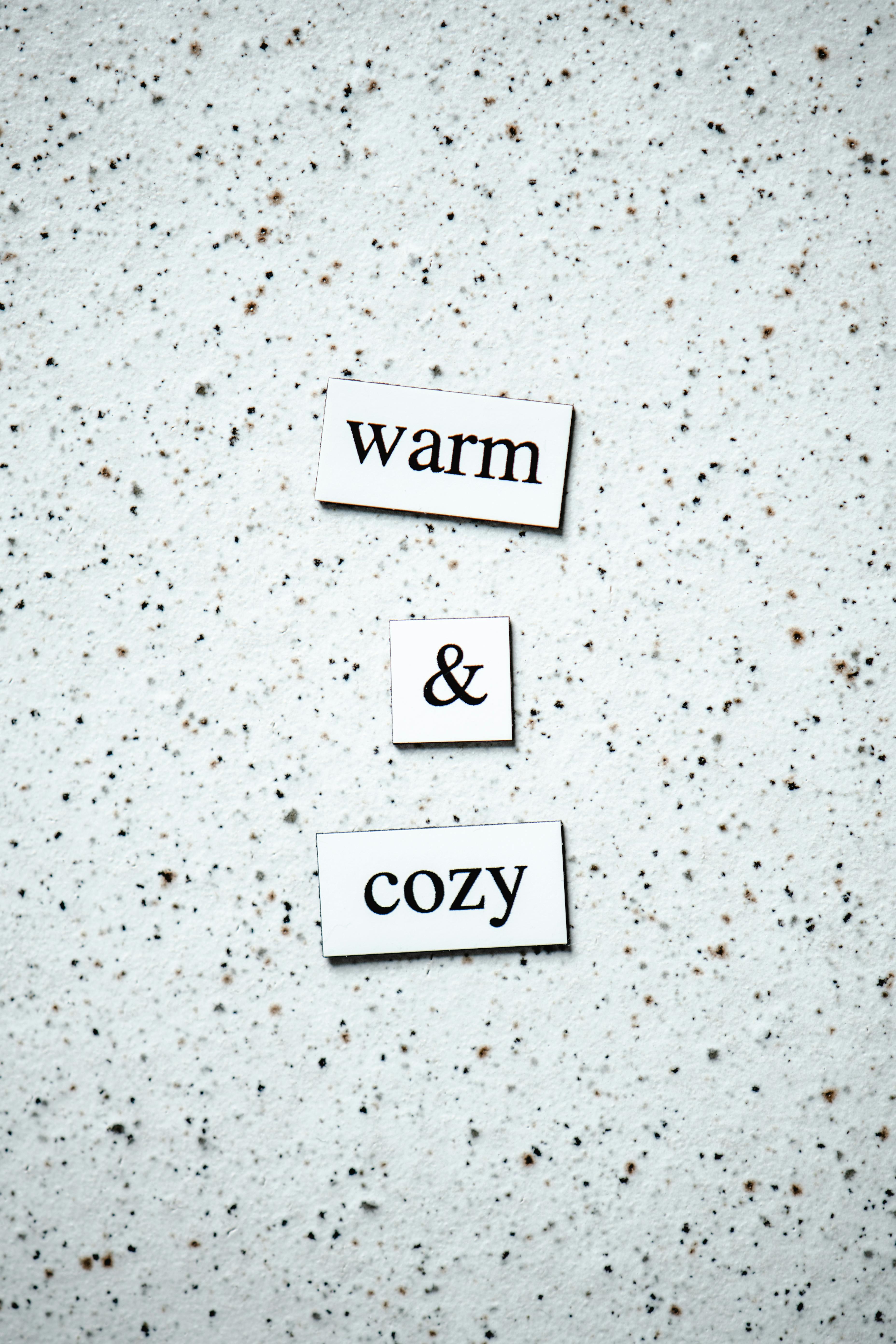 Warm and Cozy Text on Speckled Background