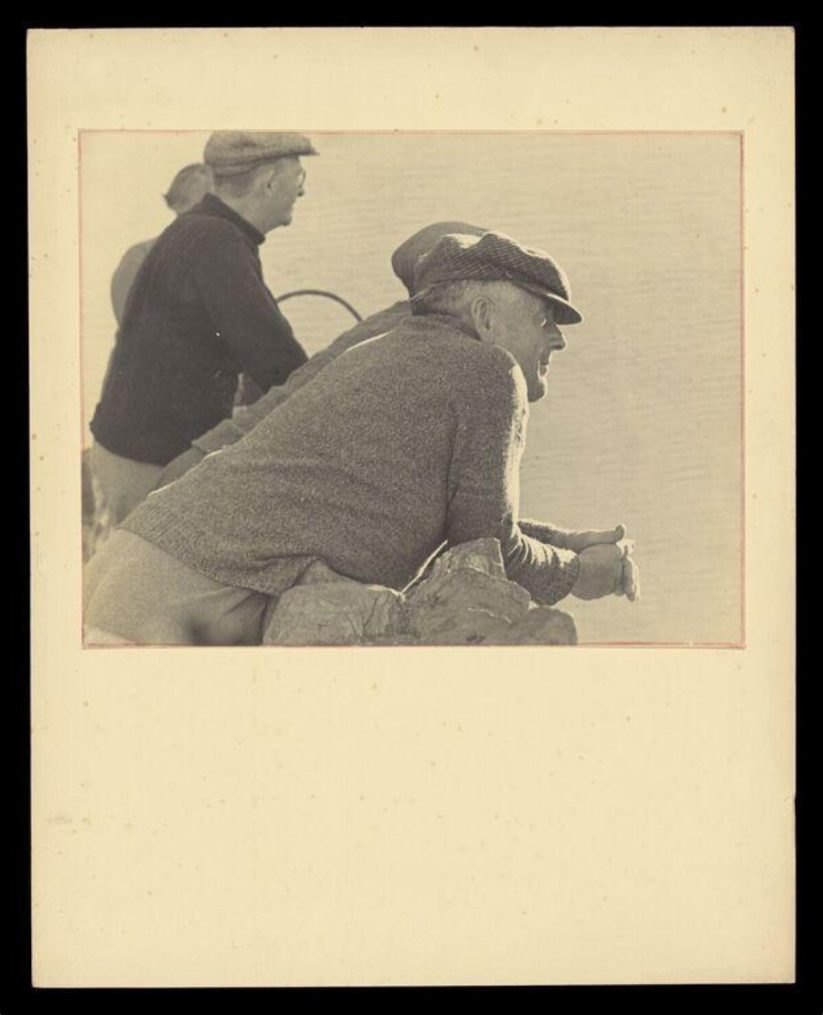 Vintage Photo of Three Men Gazing Out