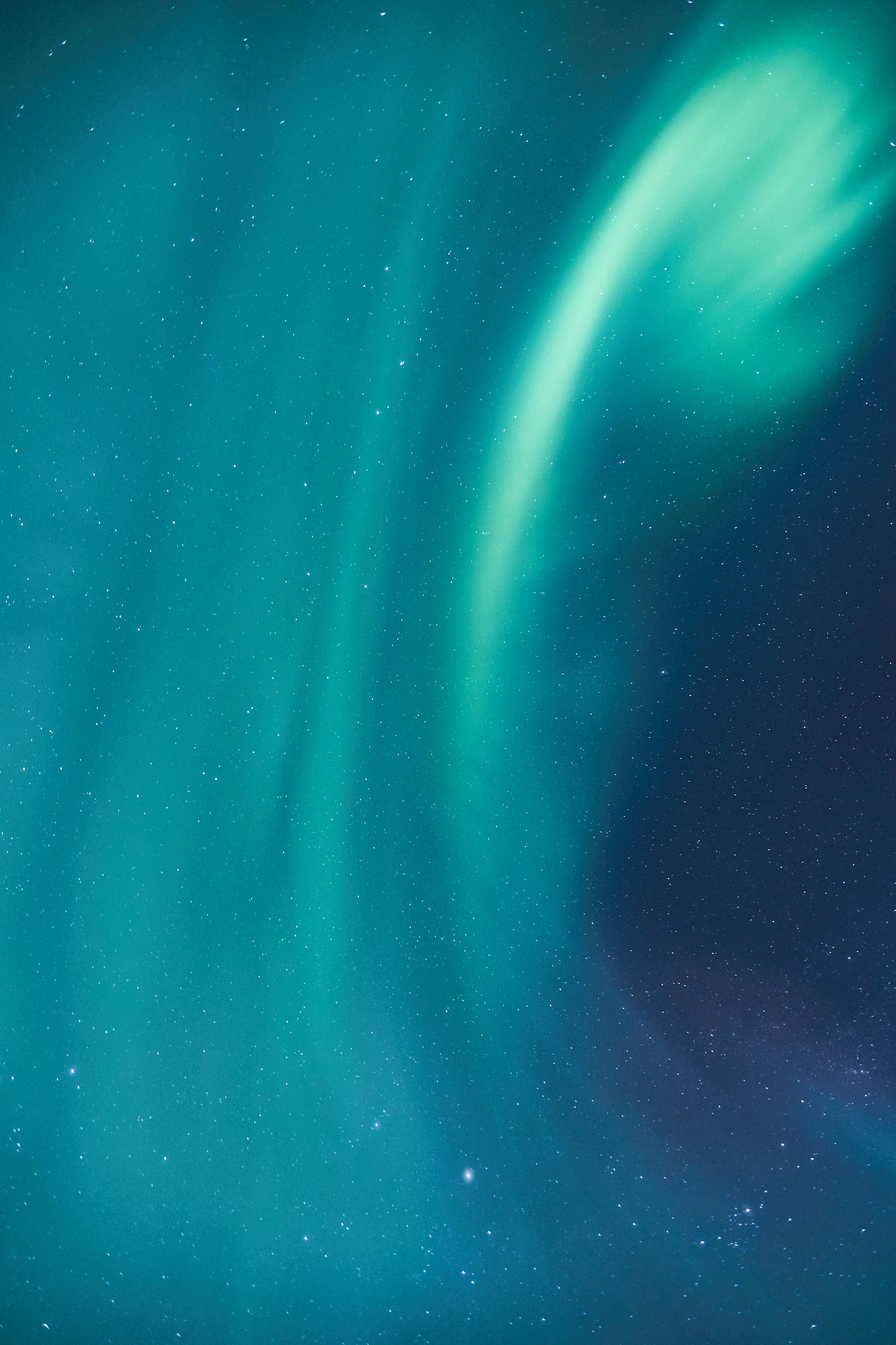 Green Aurora over Starry Sky