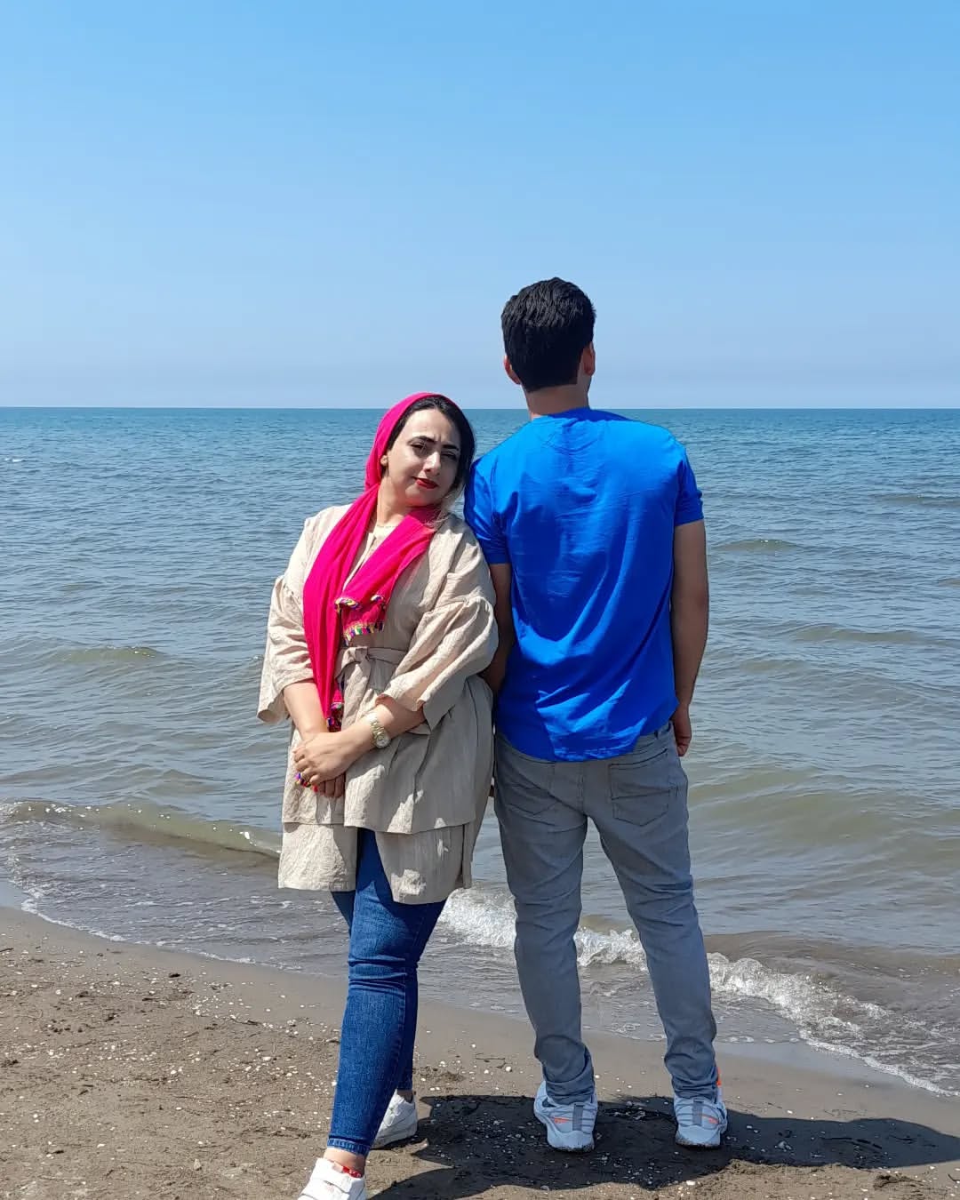 Couple Posing At Seaside Beach