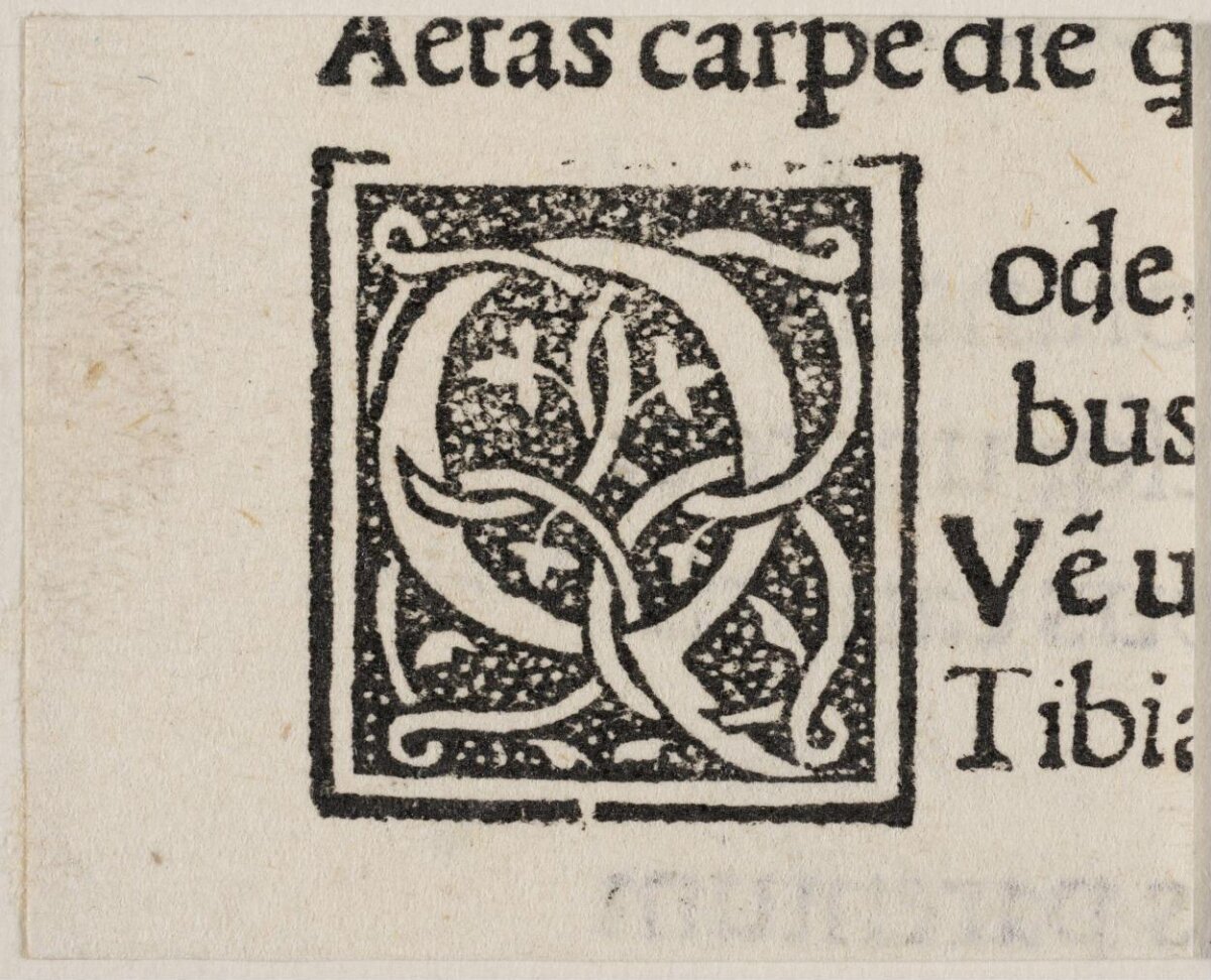 Decorated Initial Q on Antique Printed Page