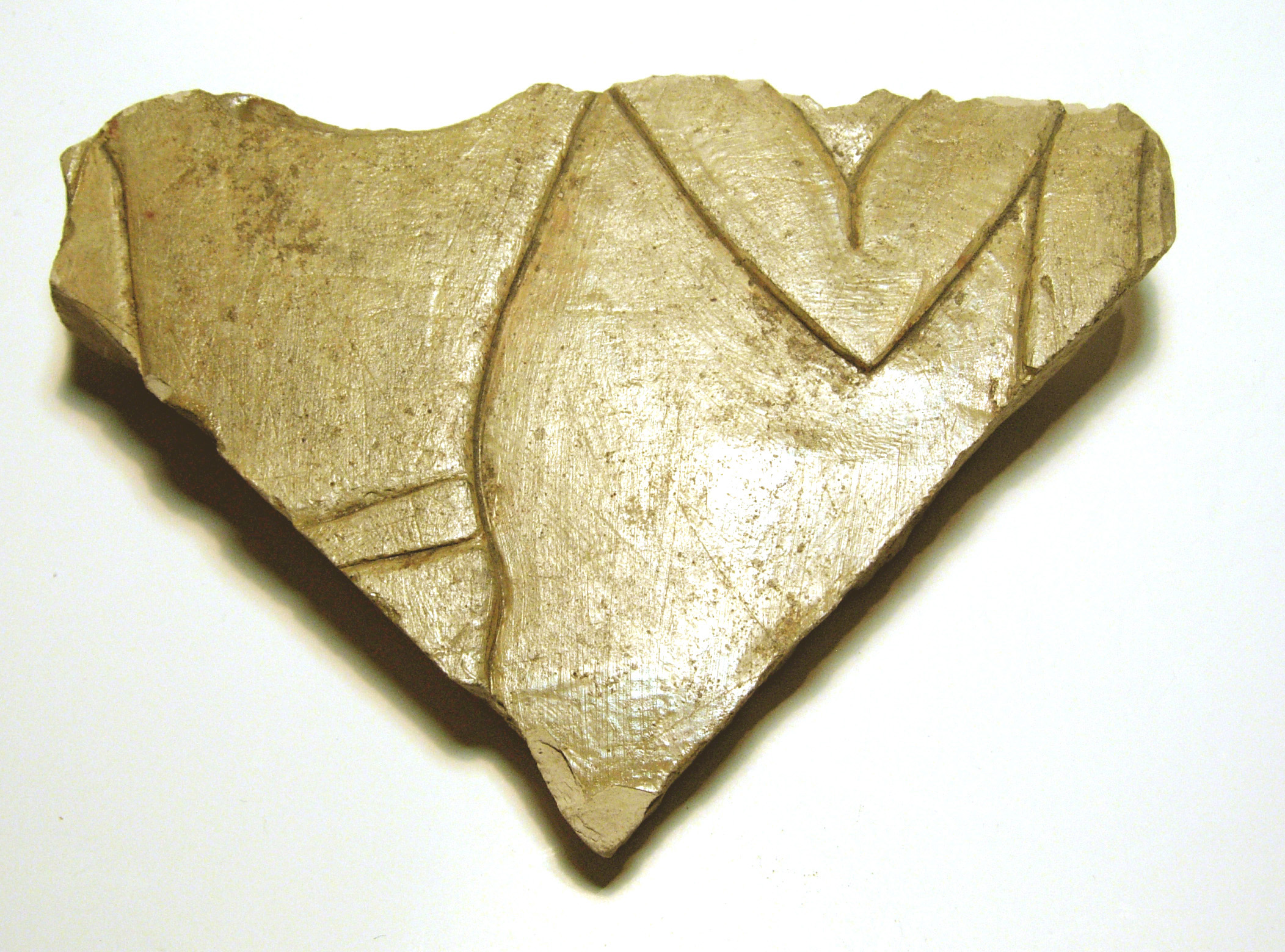 Carved Stone Fragment with Incised Pattern
