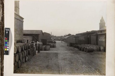 Vintage Industrial Yard With Barrels