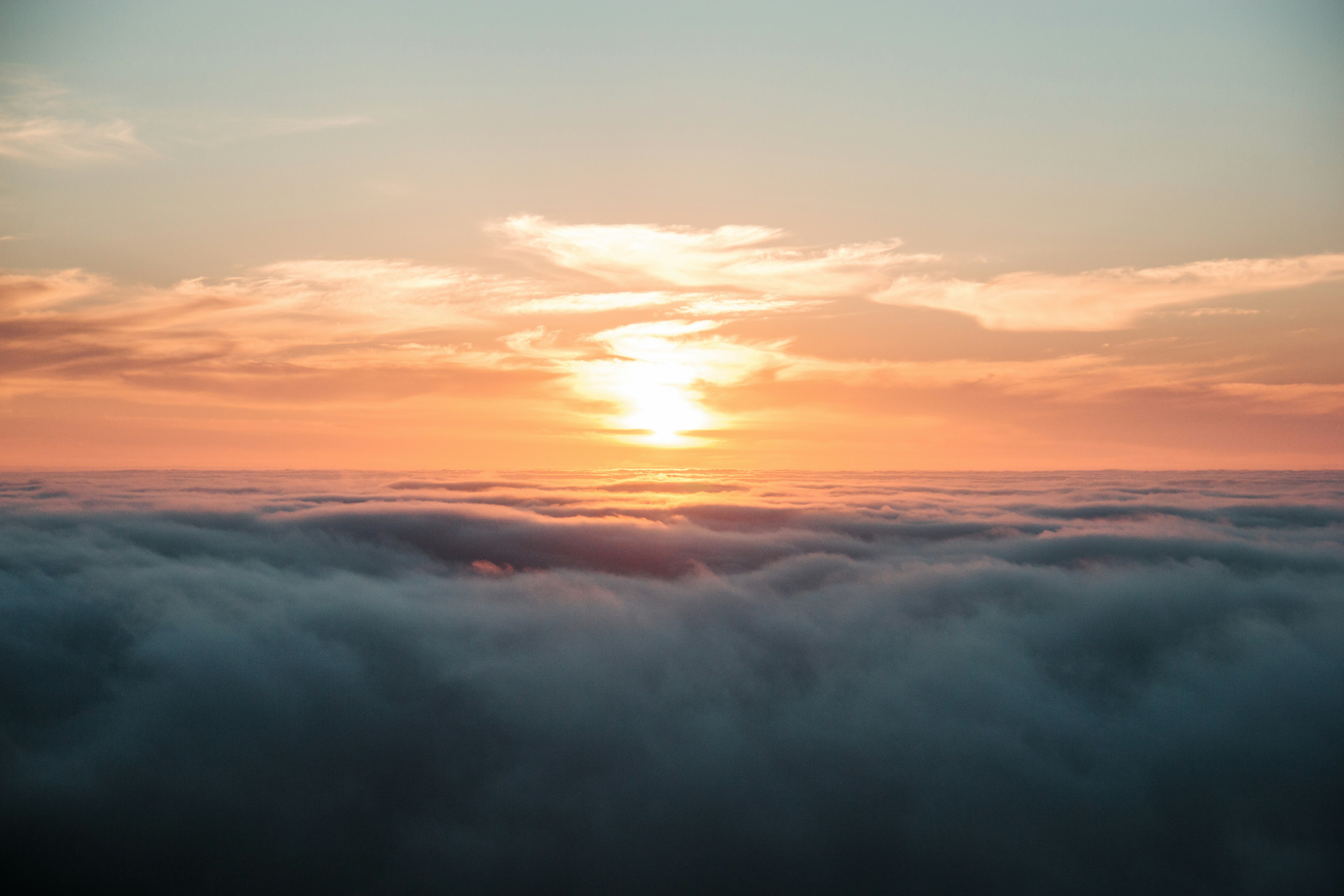 Sunset Above Sea of Clouds