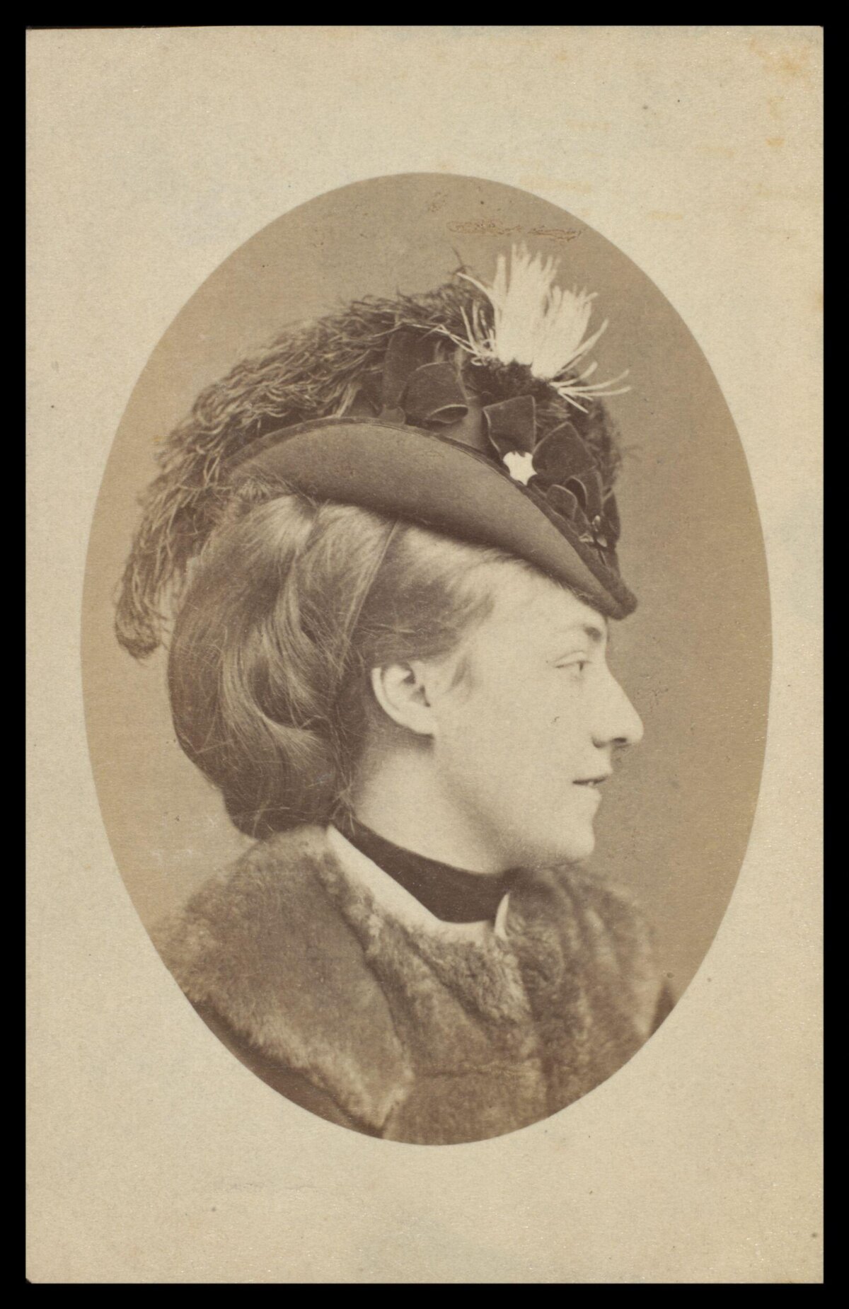 Vintage Portrait of Woman in Feathered Hat