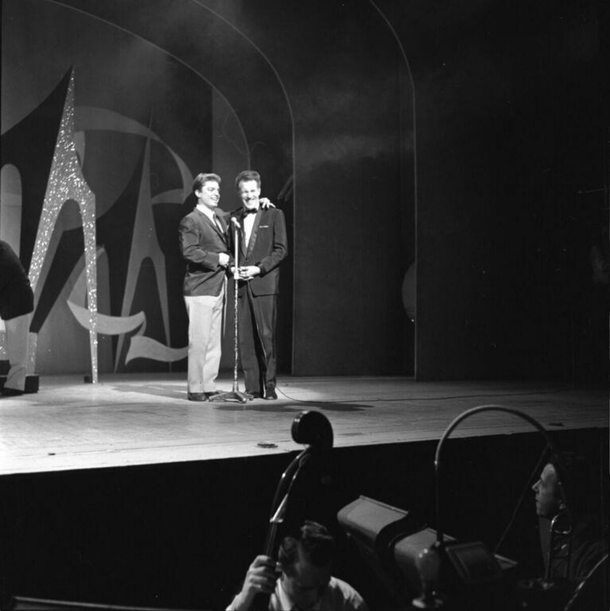 Two Men On Stage At Award Ceremony