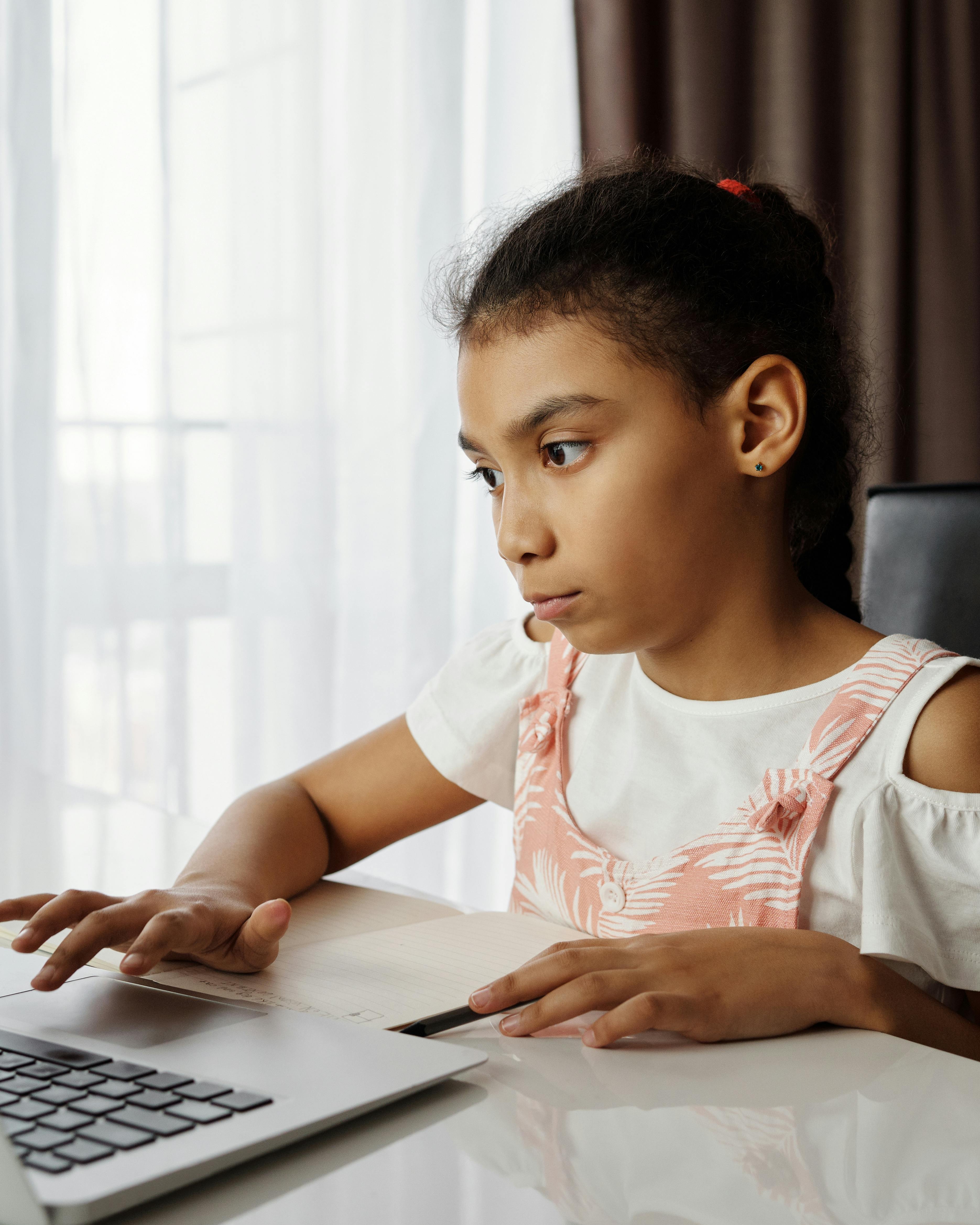 Girl Focused on Remote Learning