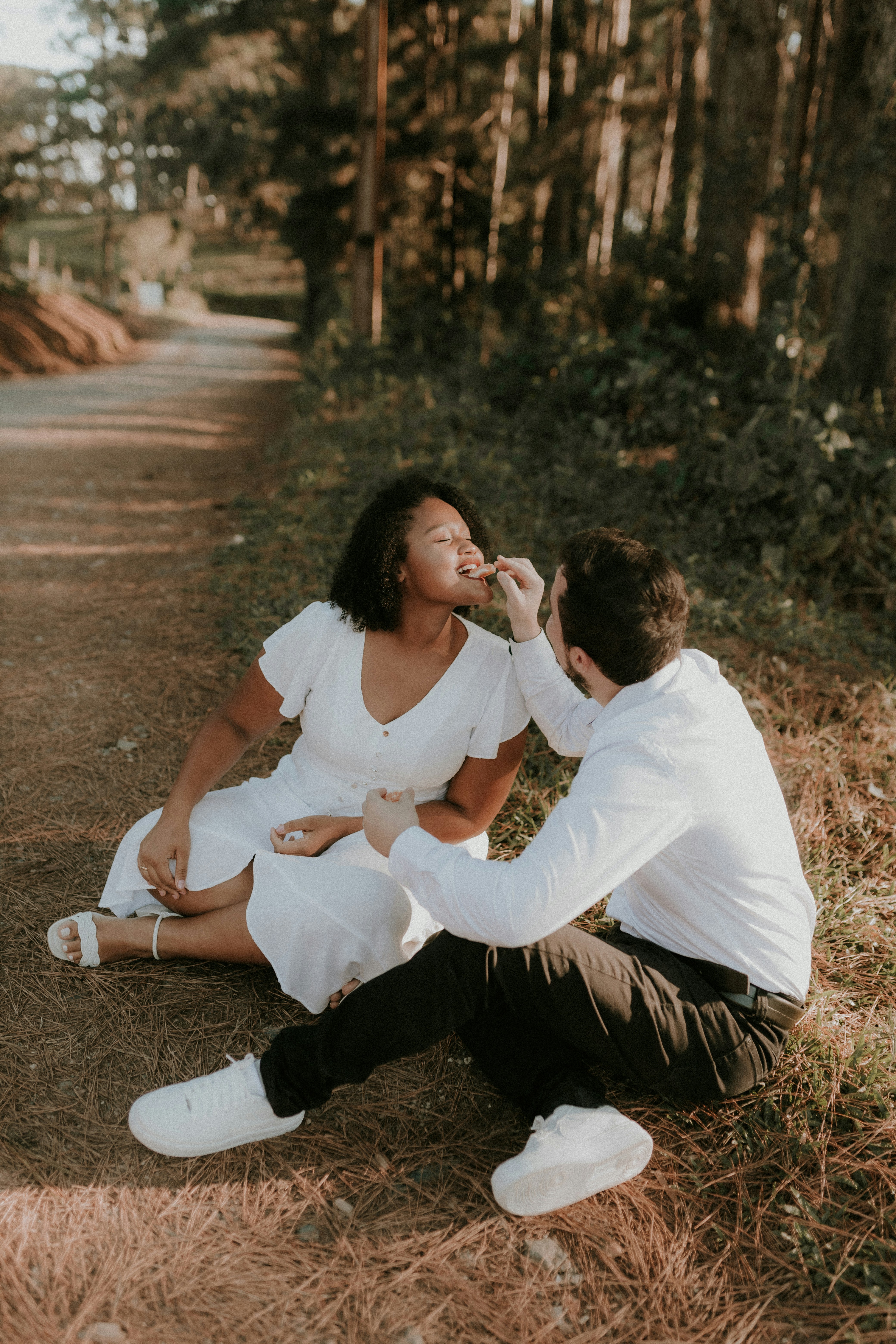 Couple Sharing Snack Outdoors