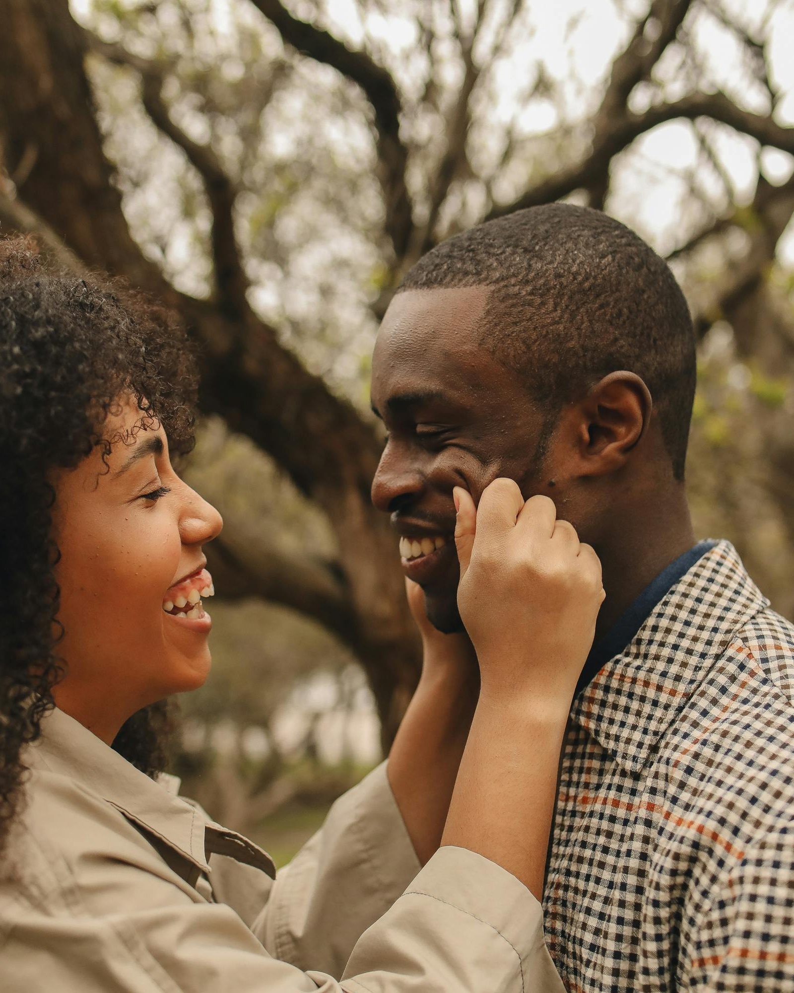 Joyful Couple Laughing Outdoors